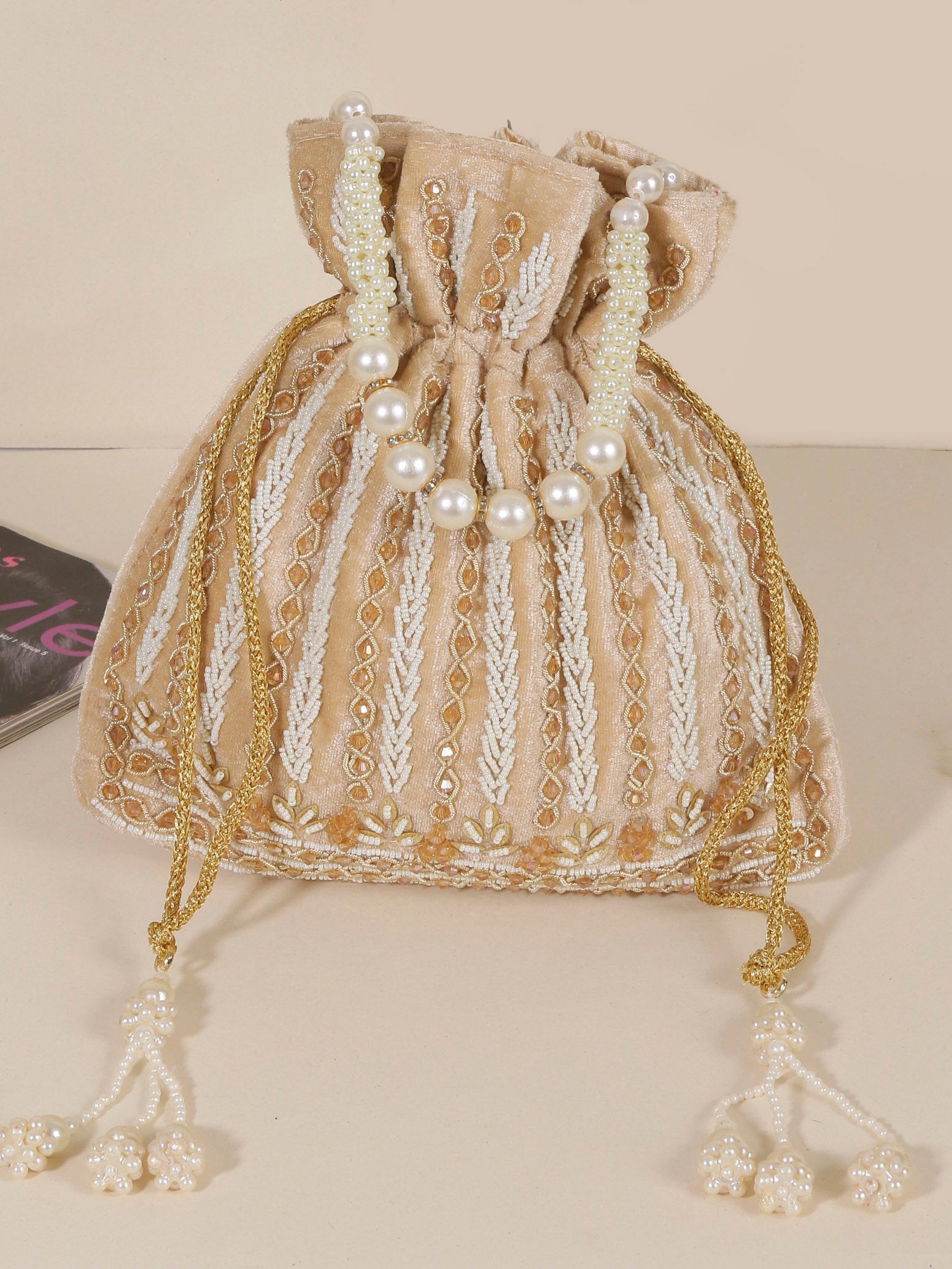 Swisni golden potli bag