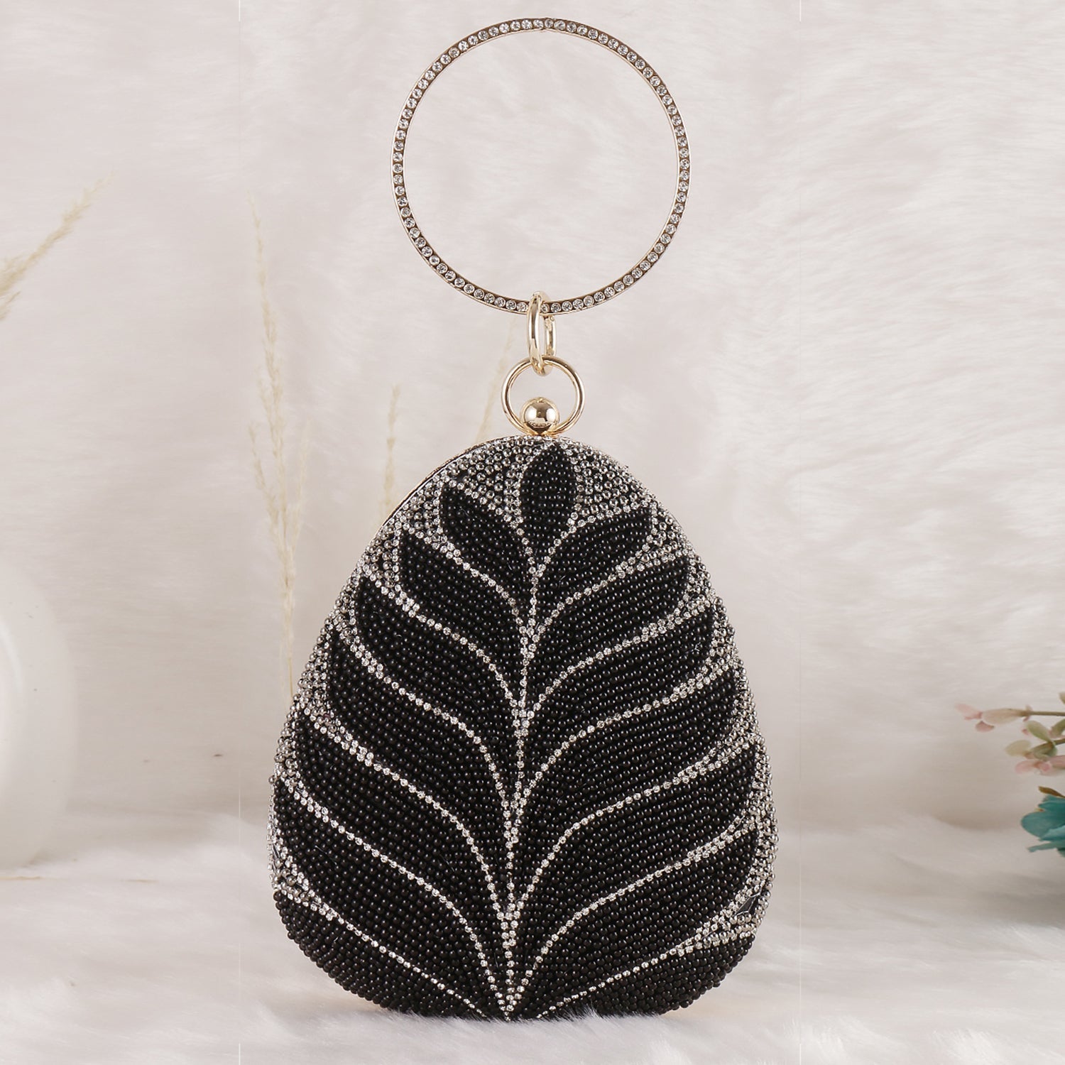 Exclusive Embroidered egg shape Designer black clutch