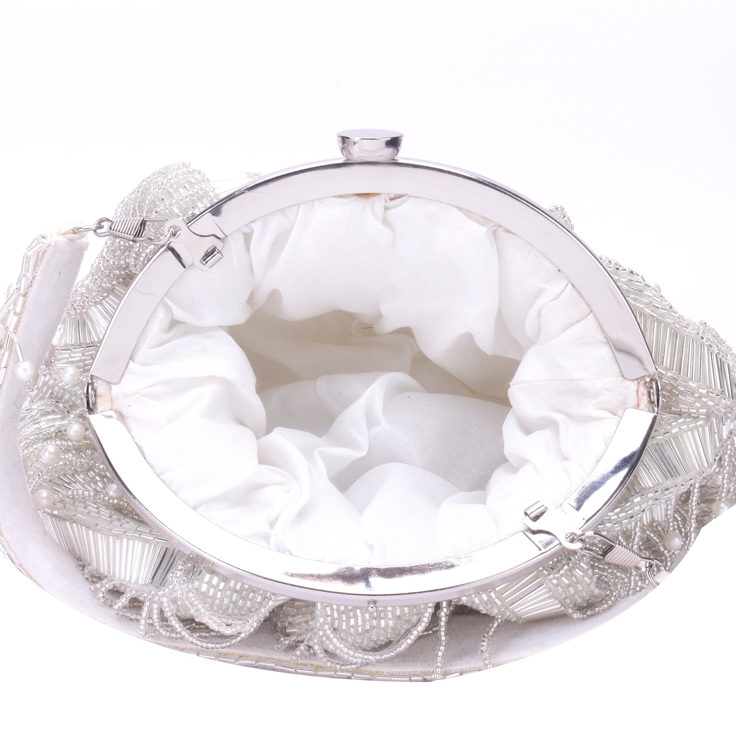 silver tassel batua clutch