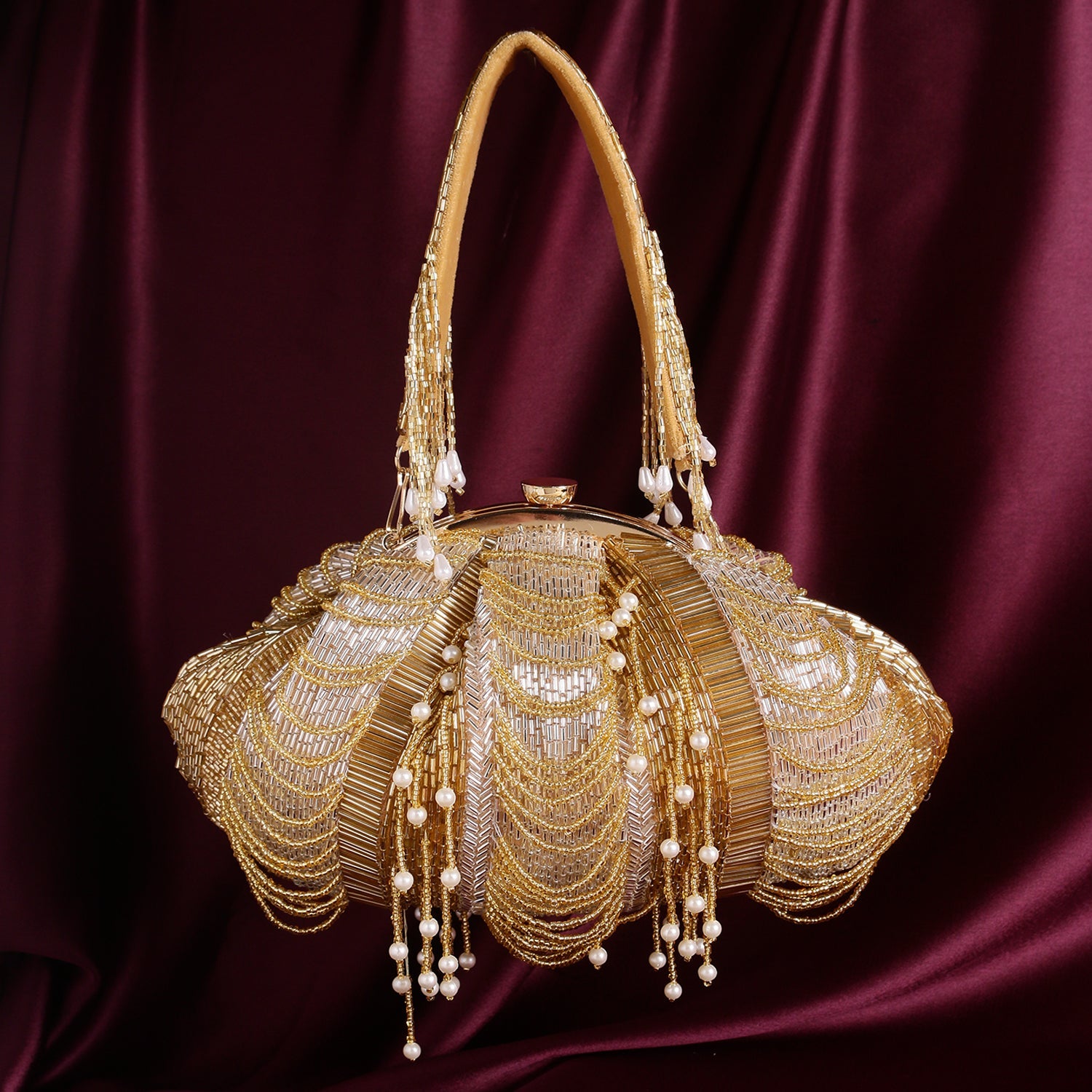 SWISNI GOLDEN EMBROIDERED BATUA BAG