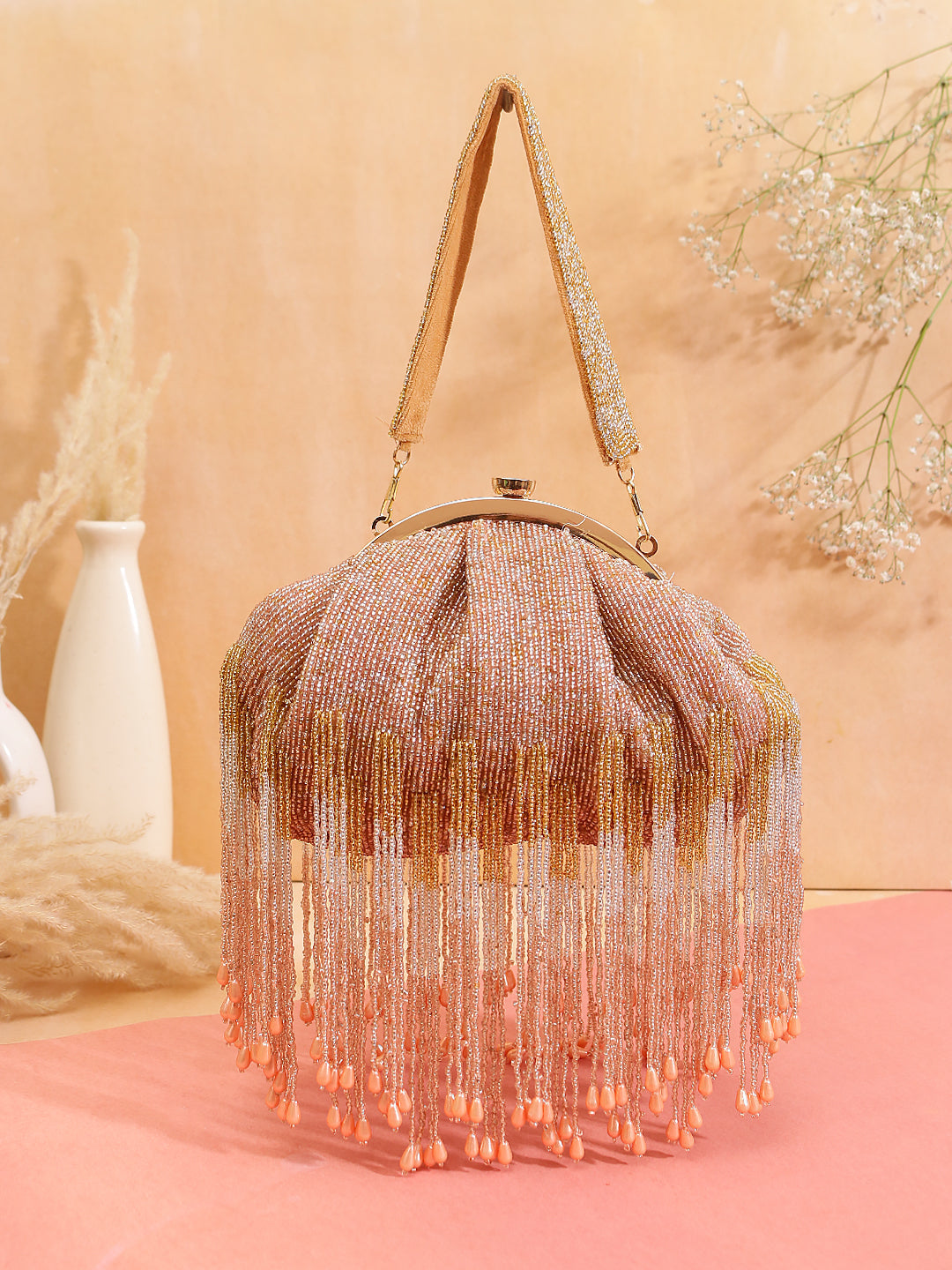 peachy tassel batua clutch