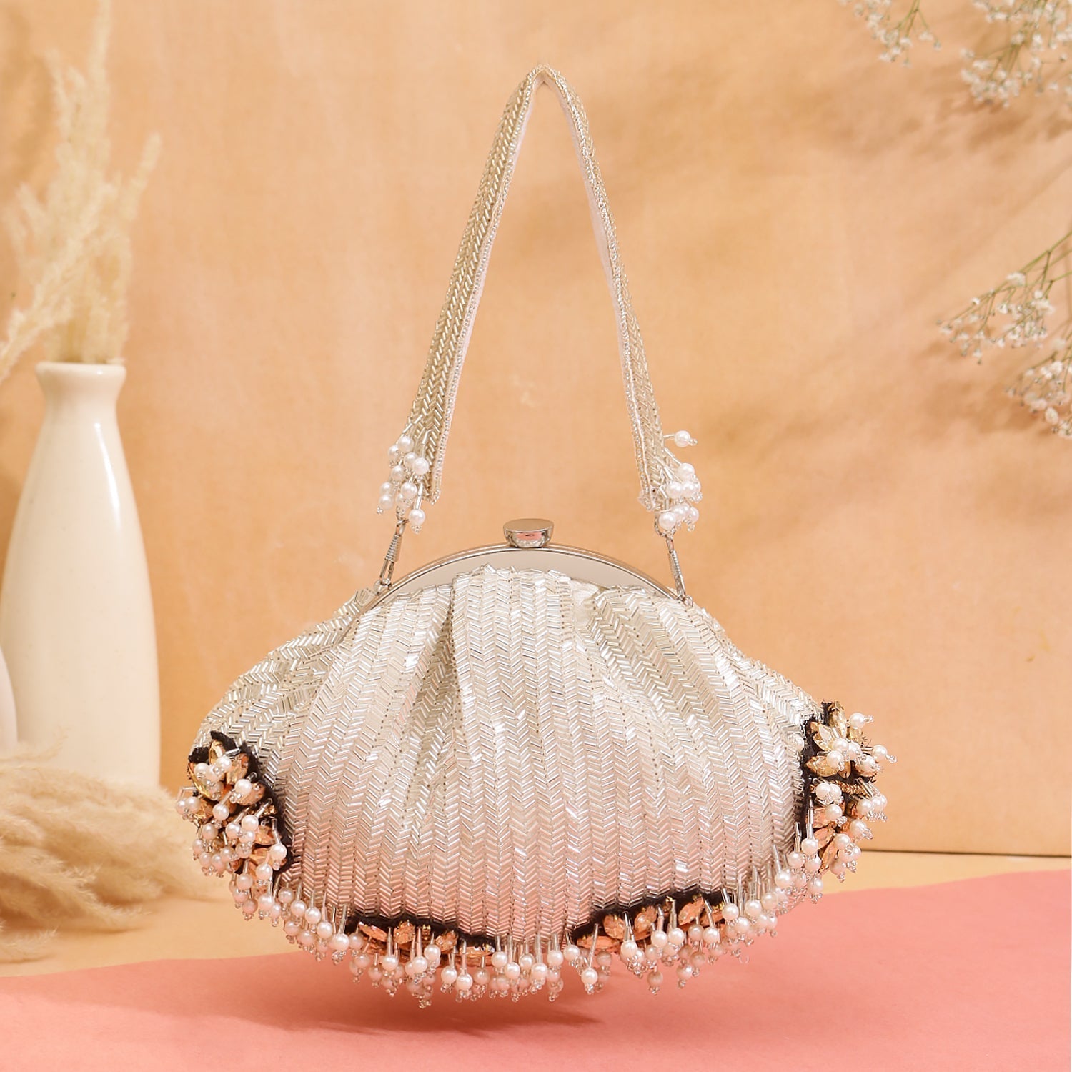 silver brooch design batua clutch