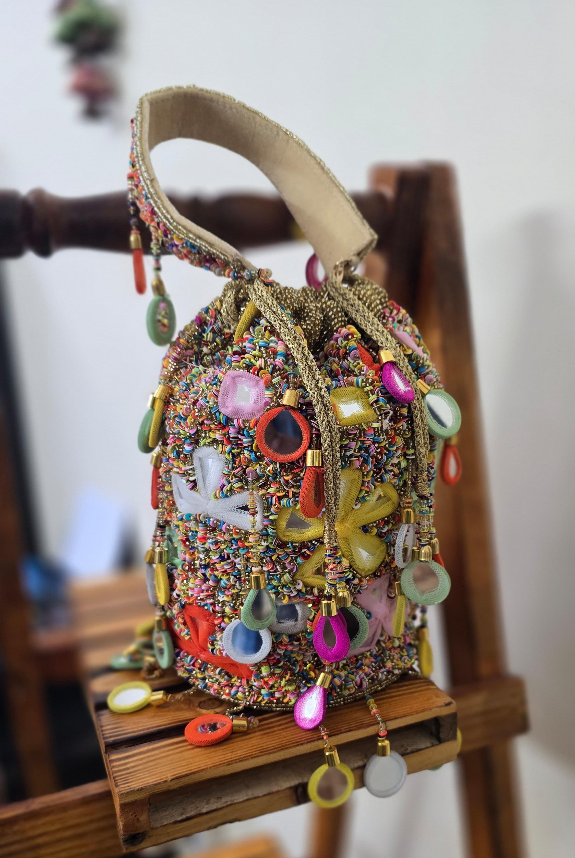 Golden mirror potli bags