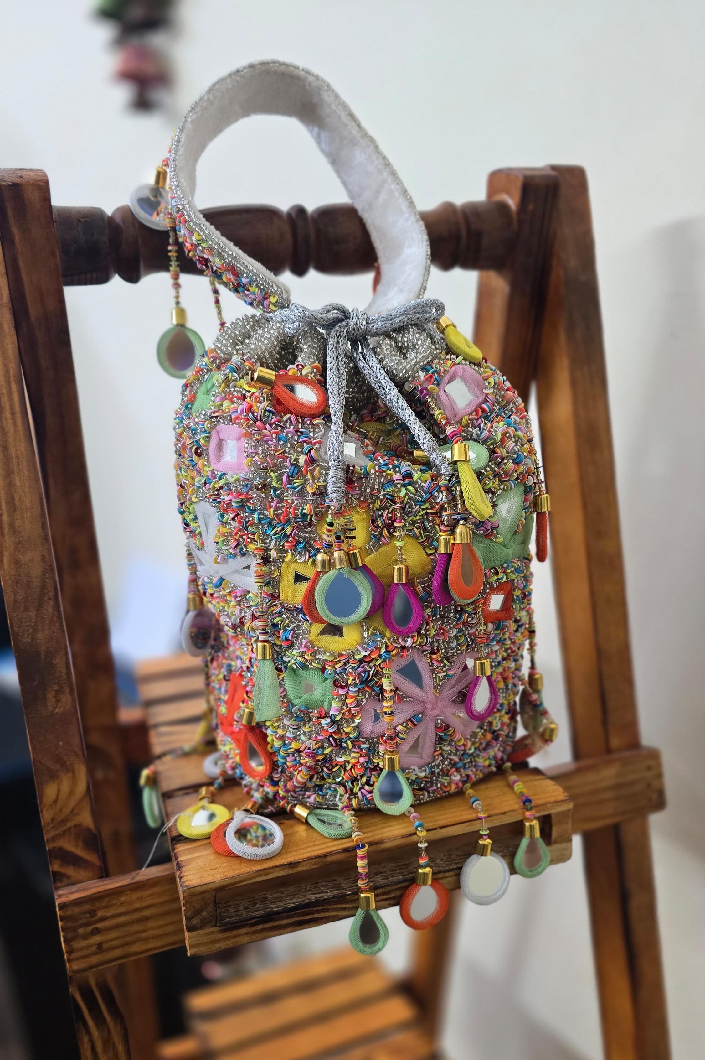 Silver mirror potli bags