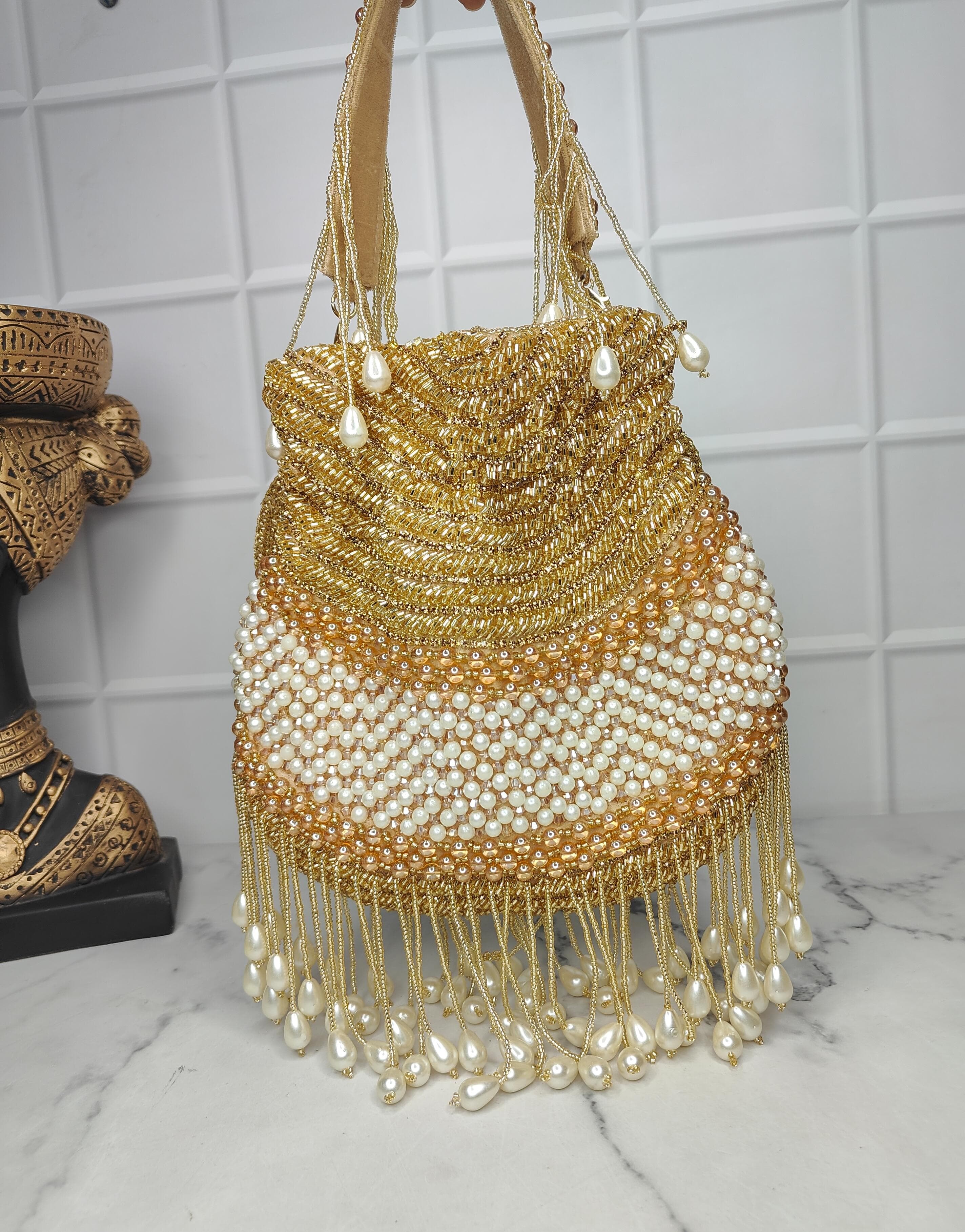 Golden Heavy potli bag