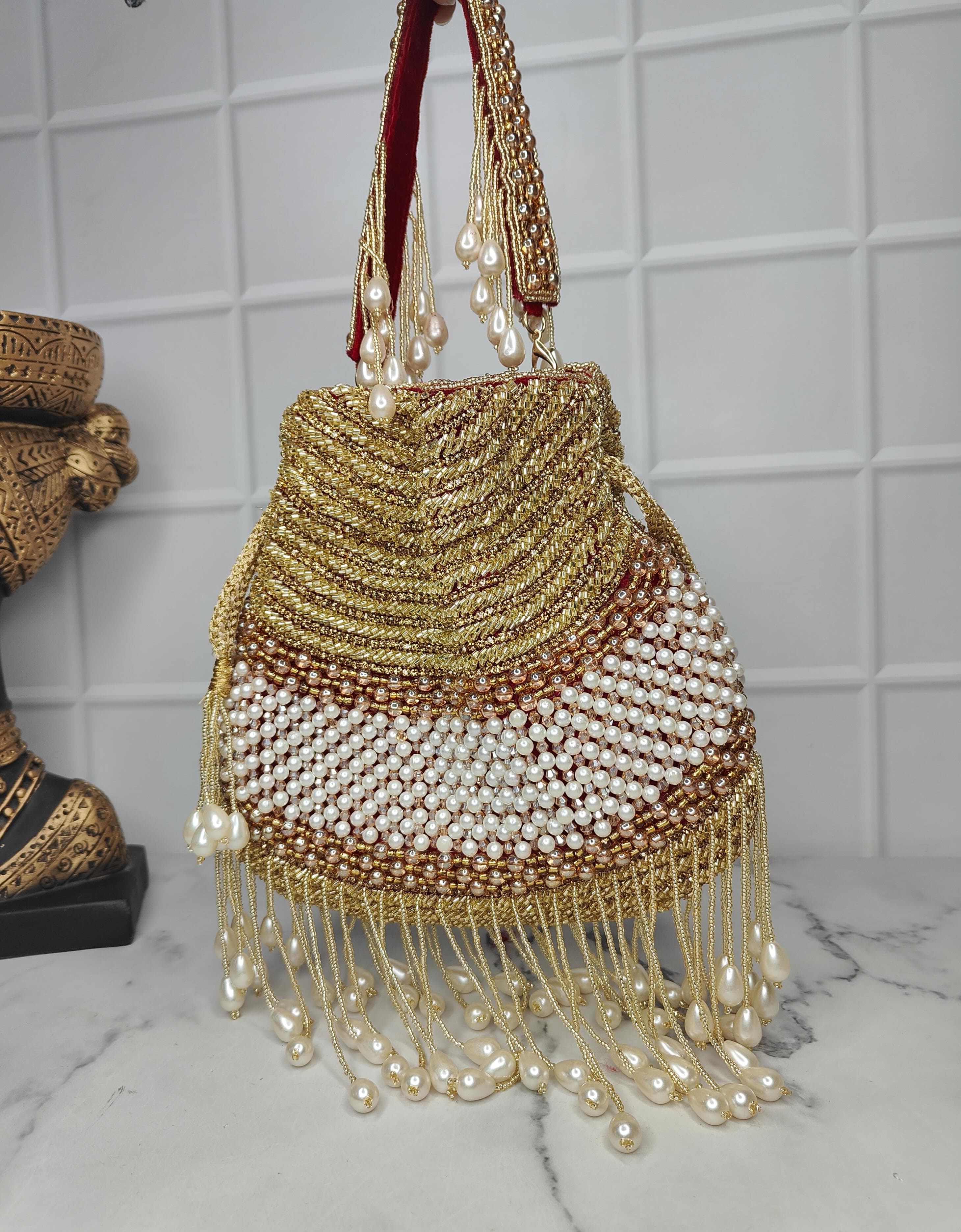 Swisni Maroon Heavy potli bags