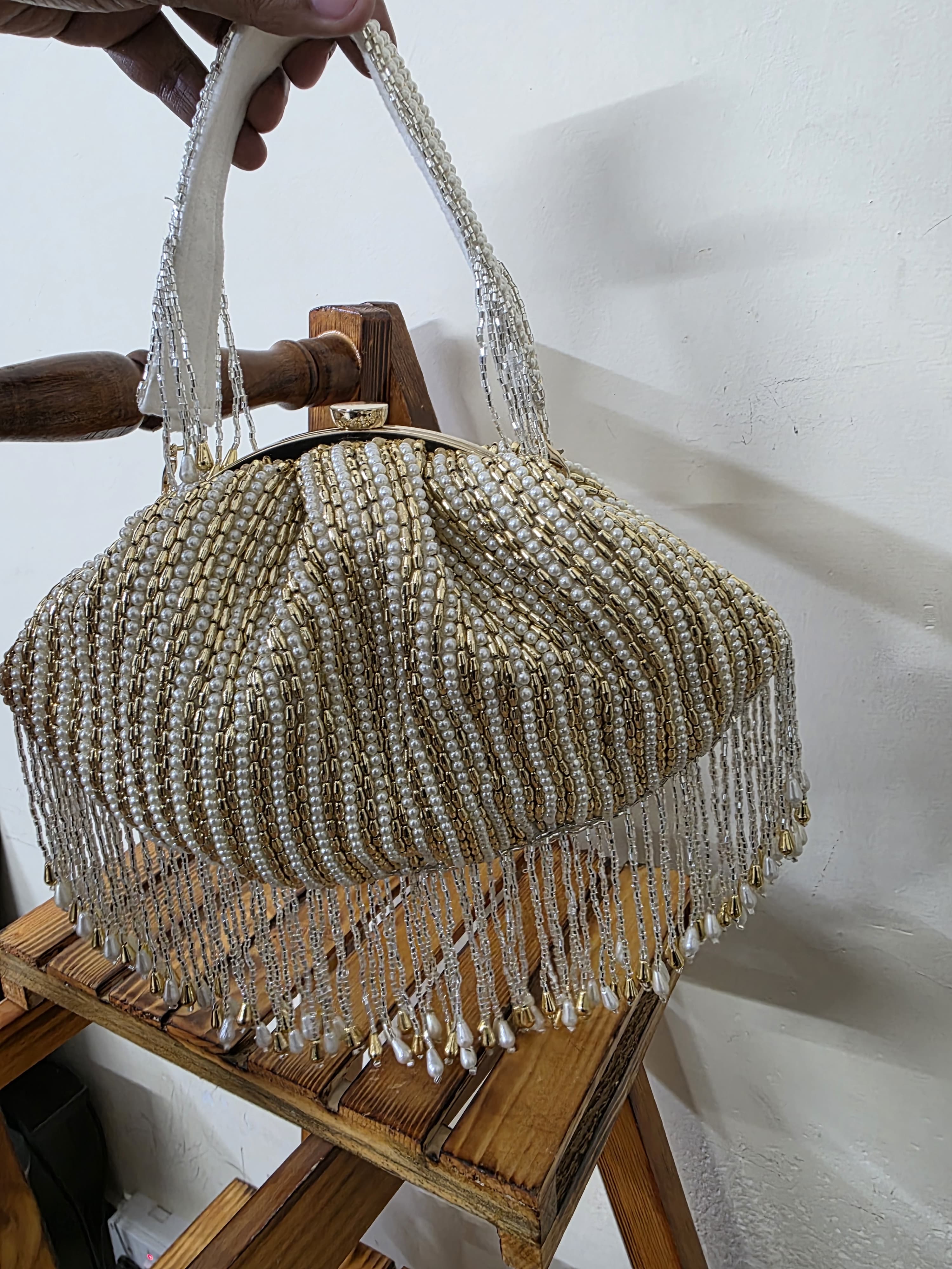 New designer batua bag