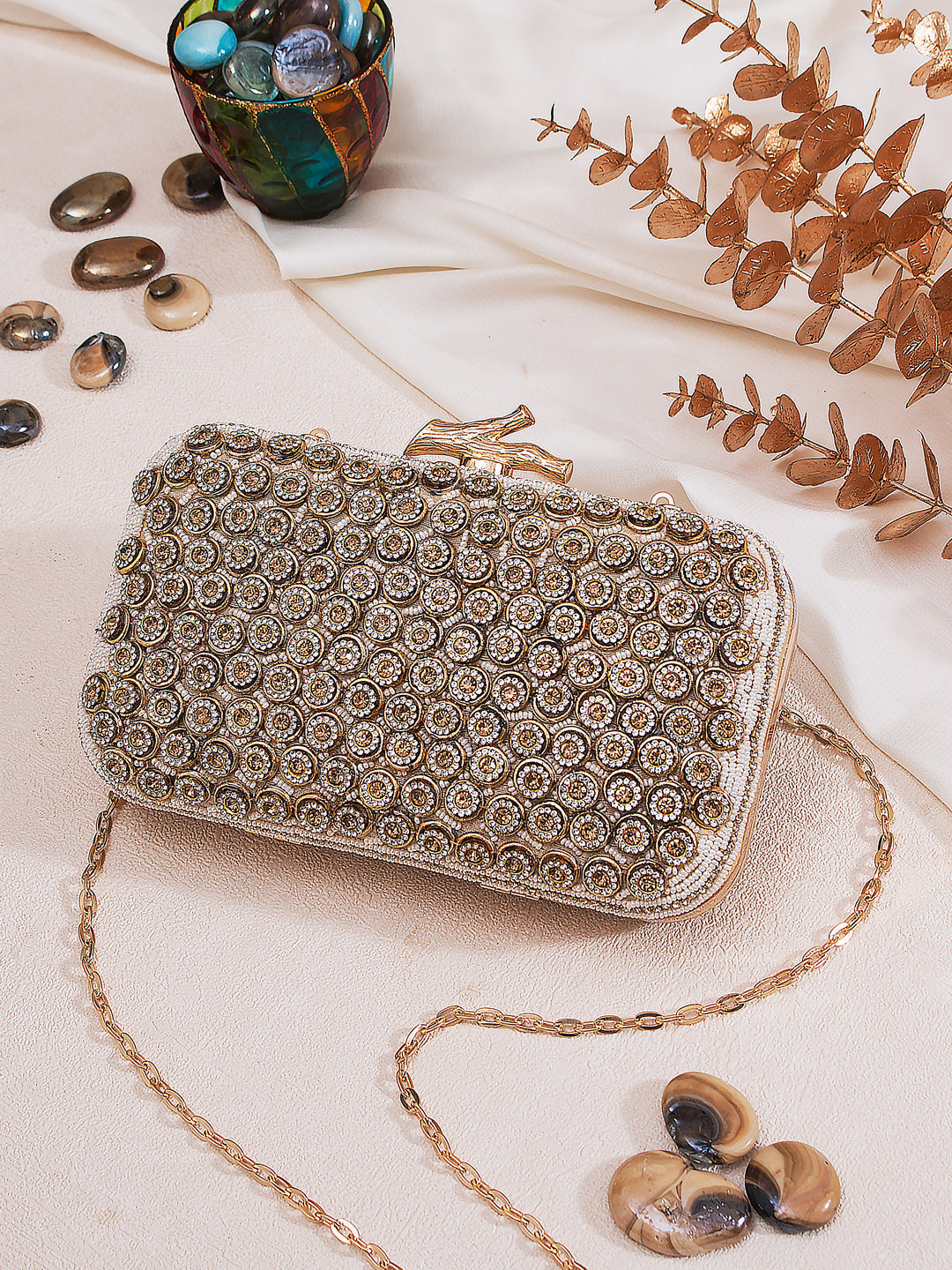 beige embroidered clutch