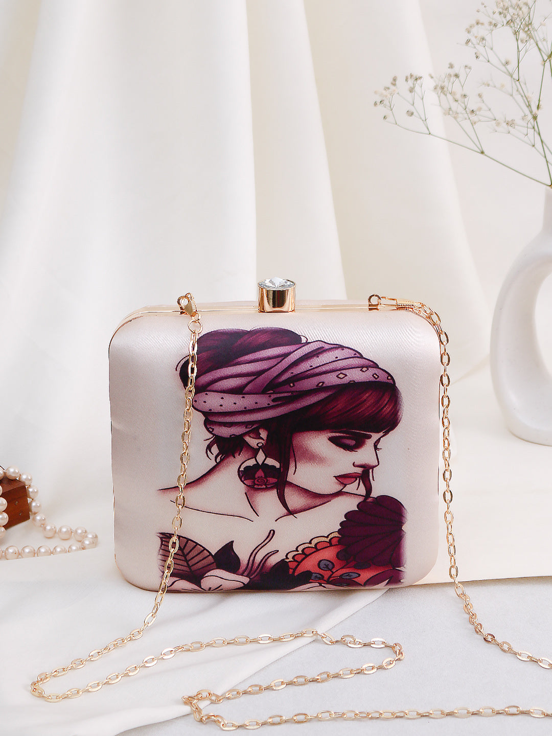 maiden printed clutch bag