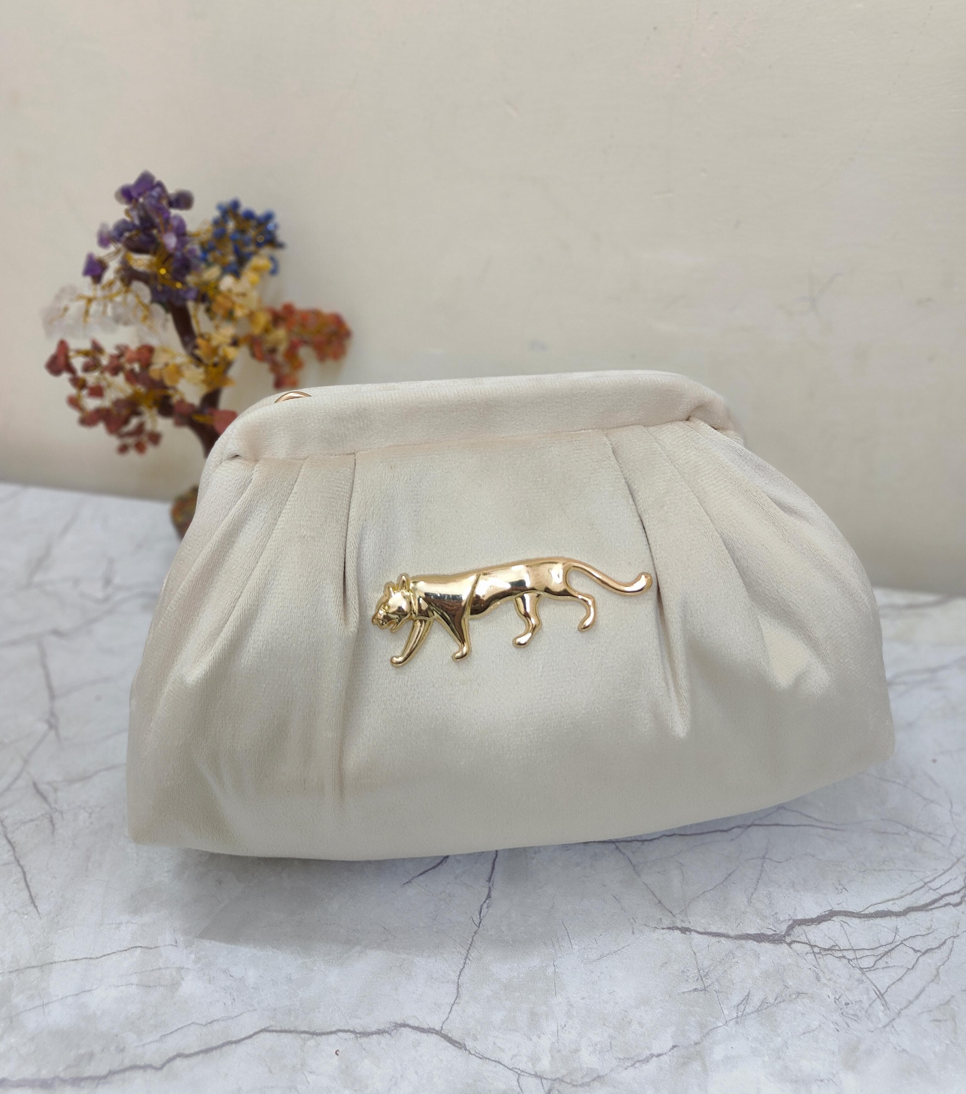 Beige Sabyasachi pouch bag