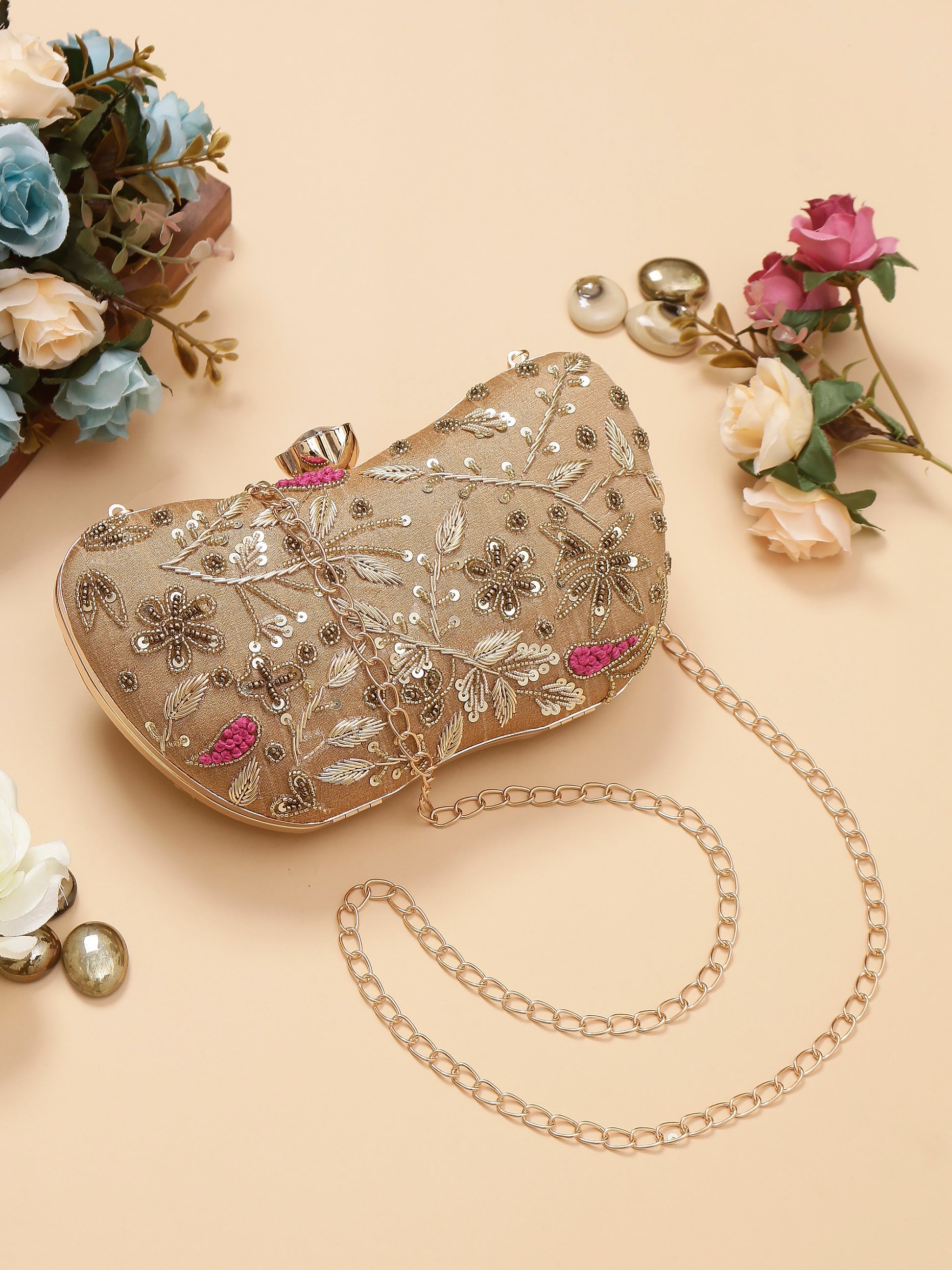 Swisni golden embroidered clutch bag