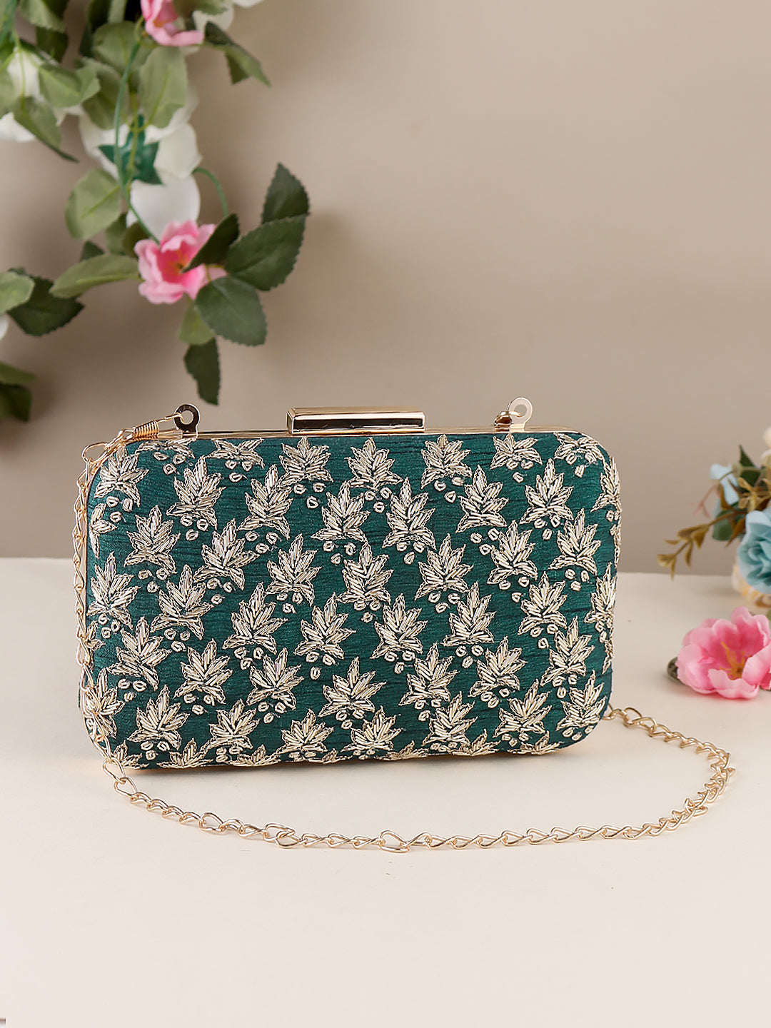 Swisni green embroidered clutch bag