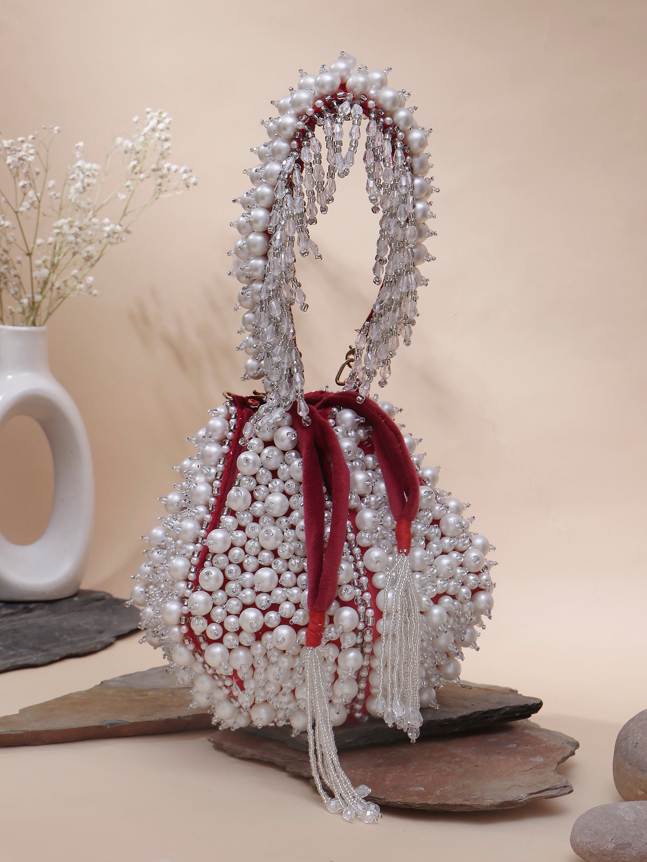 Swisni red pearl anar potli bag