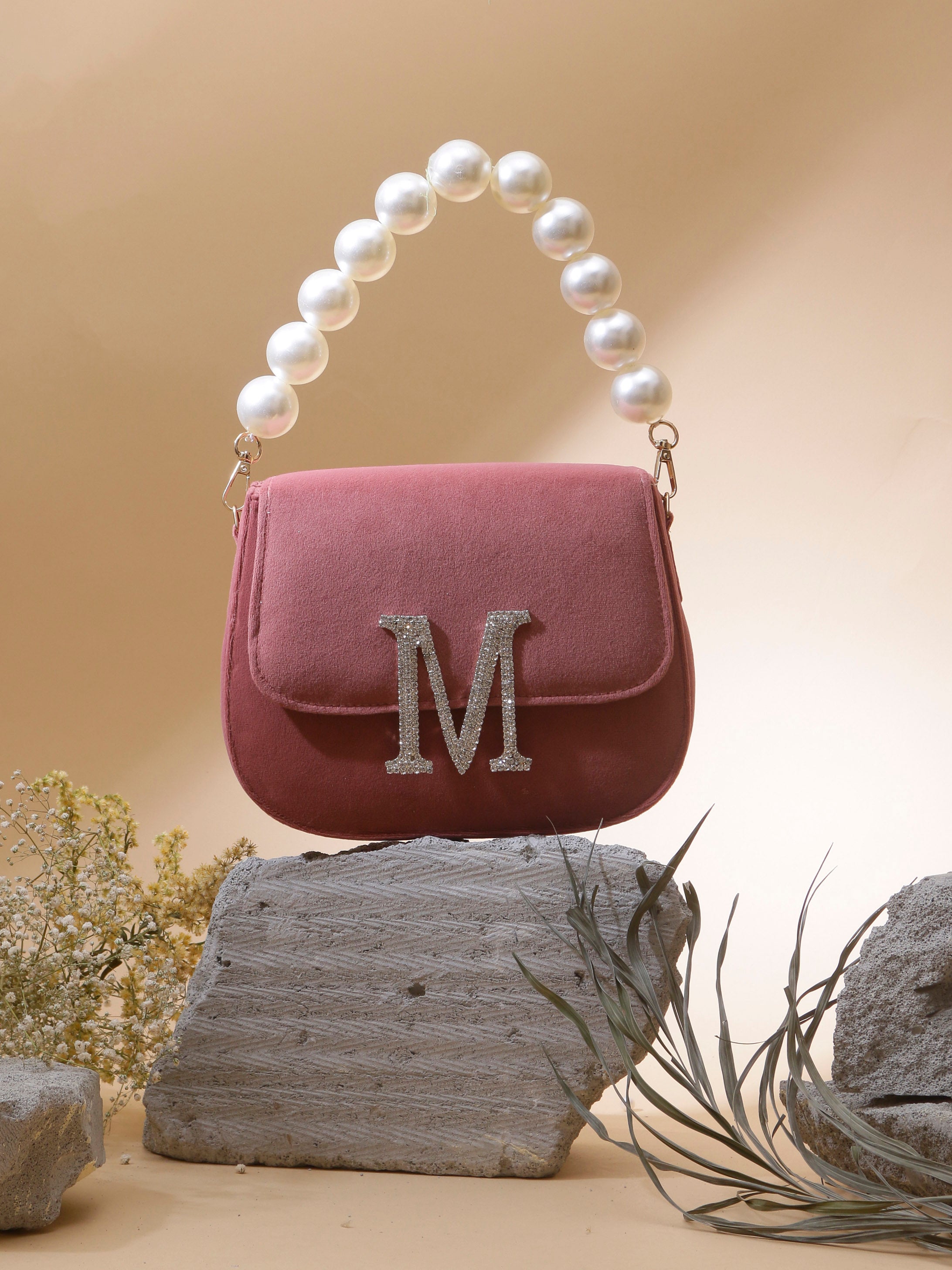 Swisni mauve monogram alphabet clutch bag