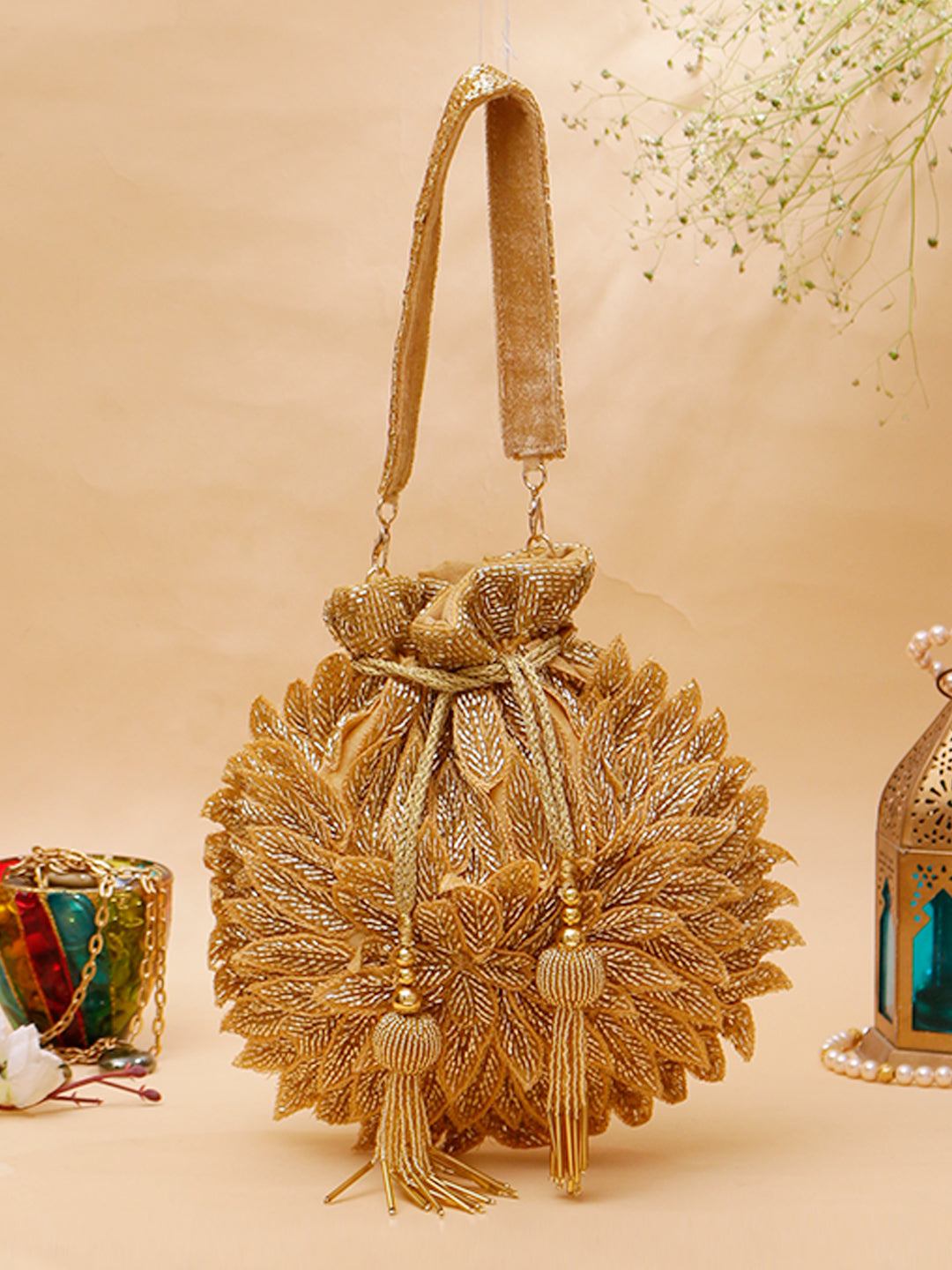 Swisni golden leaf potli bag