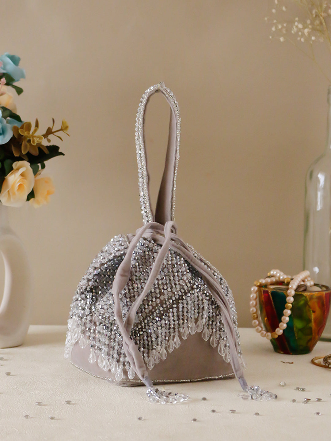Swisni Grey crystal heavy potli bag