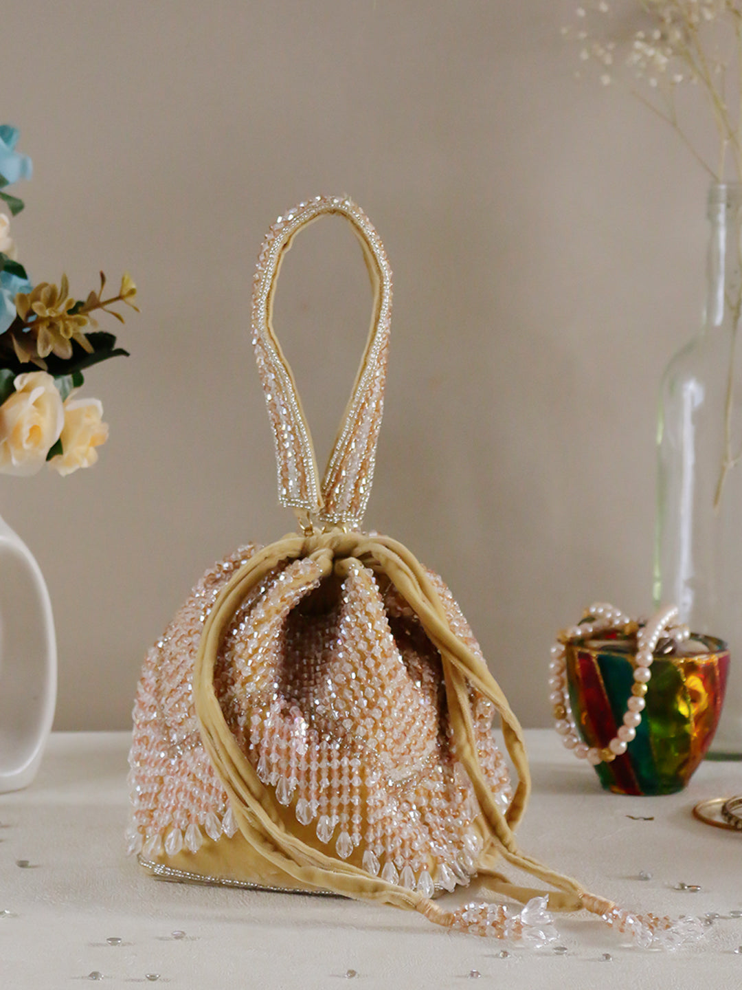 Swisni Golden crystal heavy potli bag