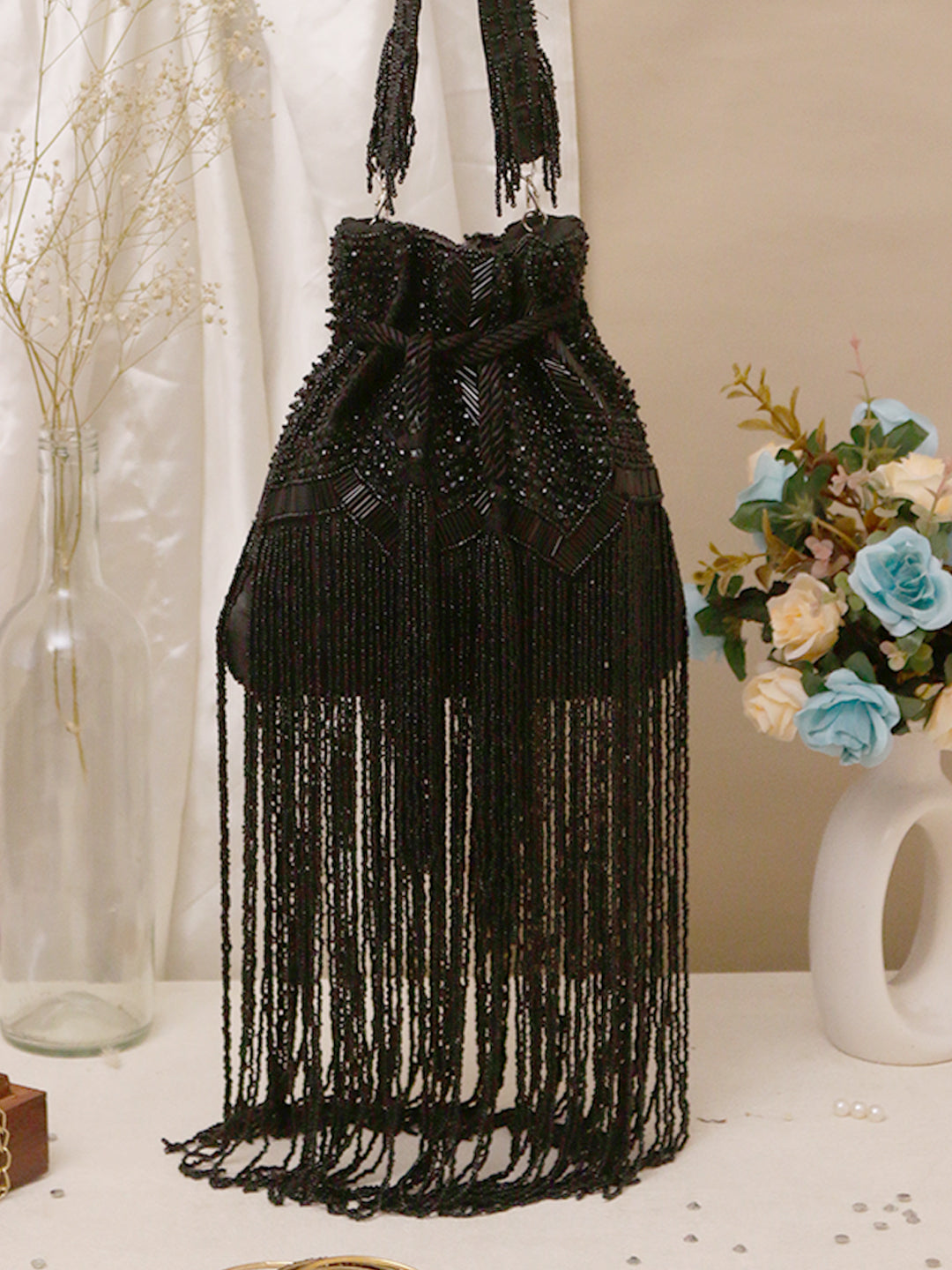 Swisni malaika black potli bag