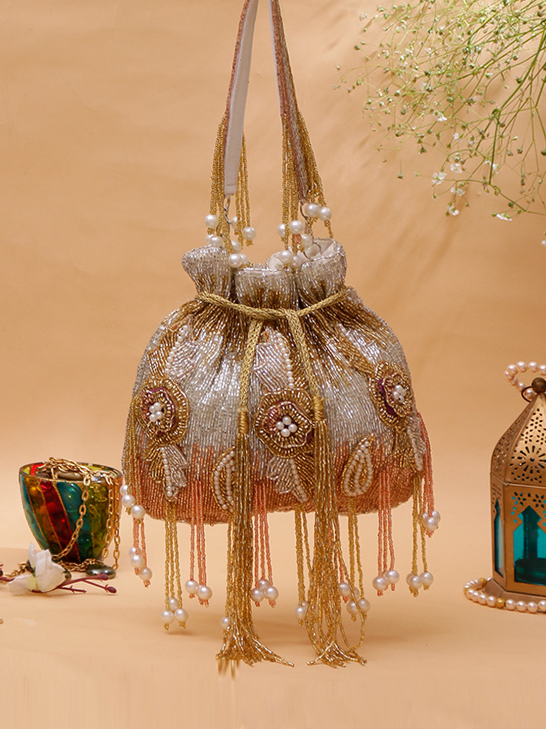 Swisni golden silver brouch potli bag