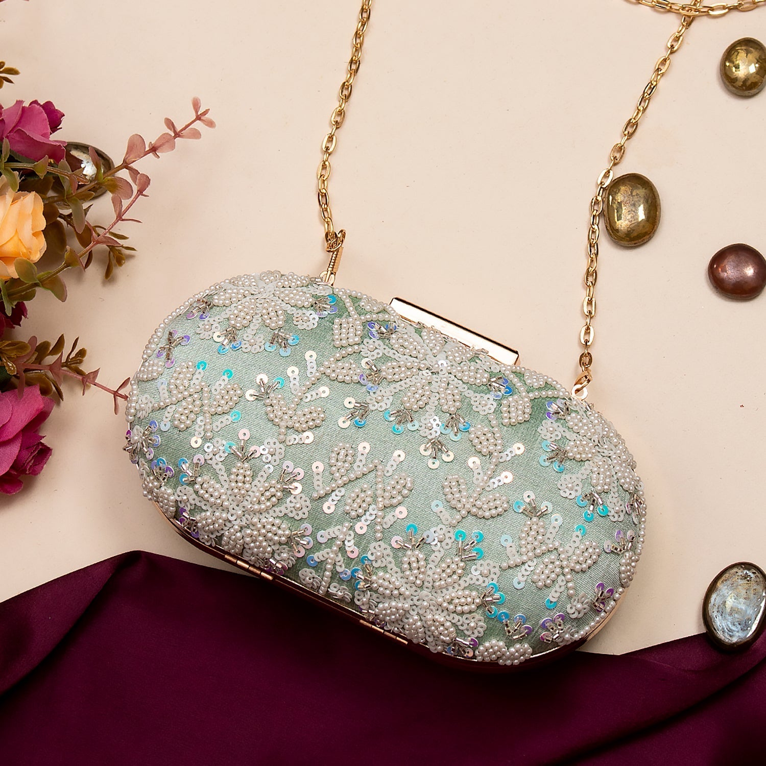 mint green oval clutch