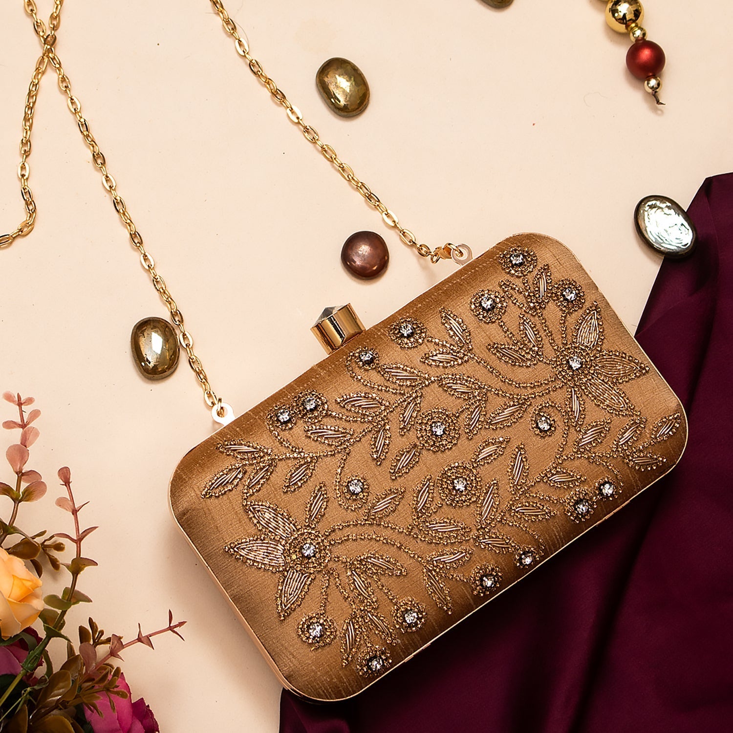 gold embroidery clutch