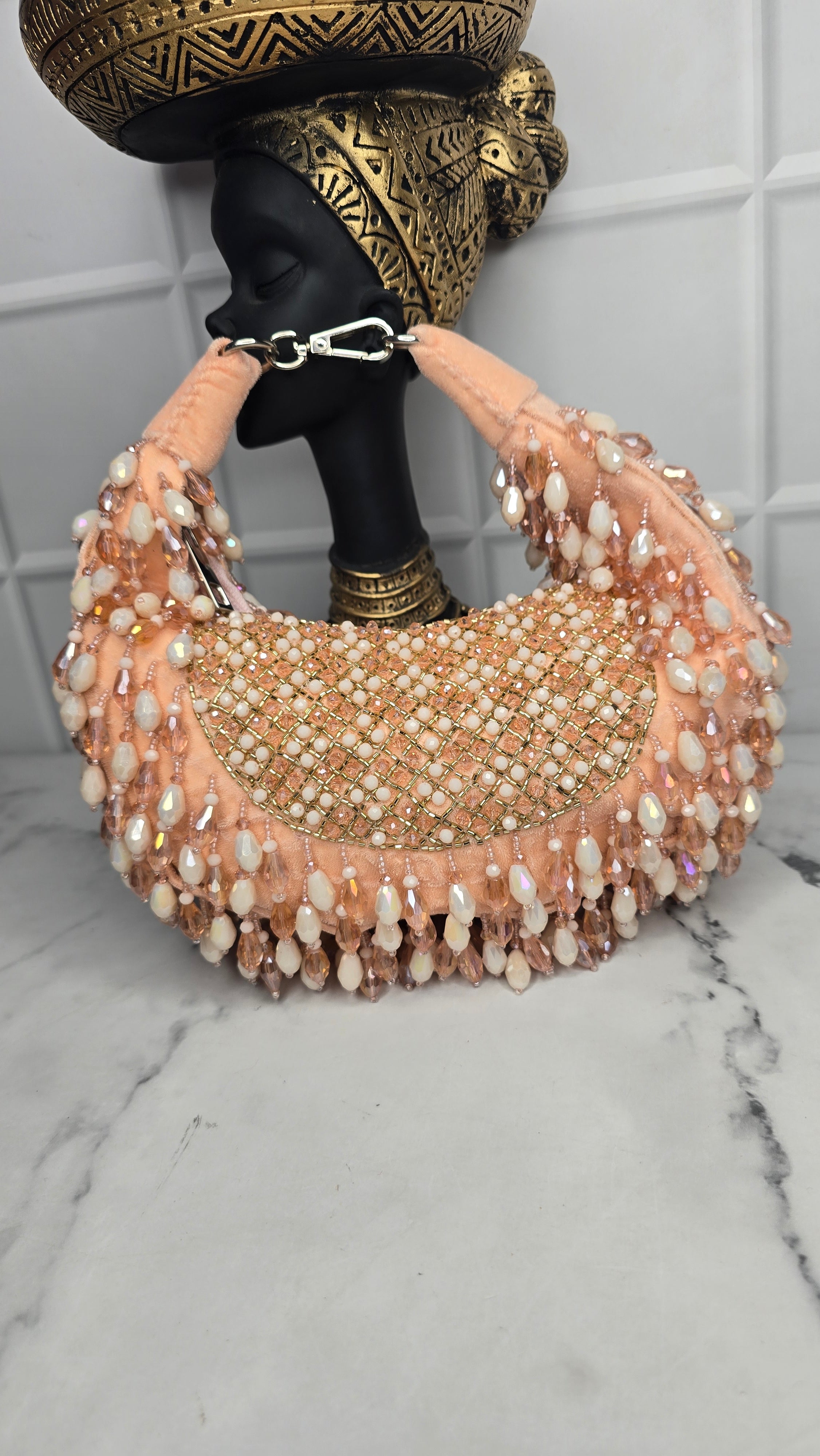 New Arohi moon clutch bag