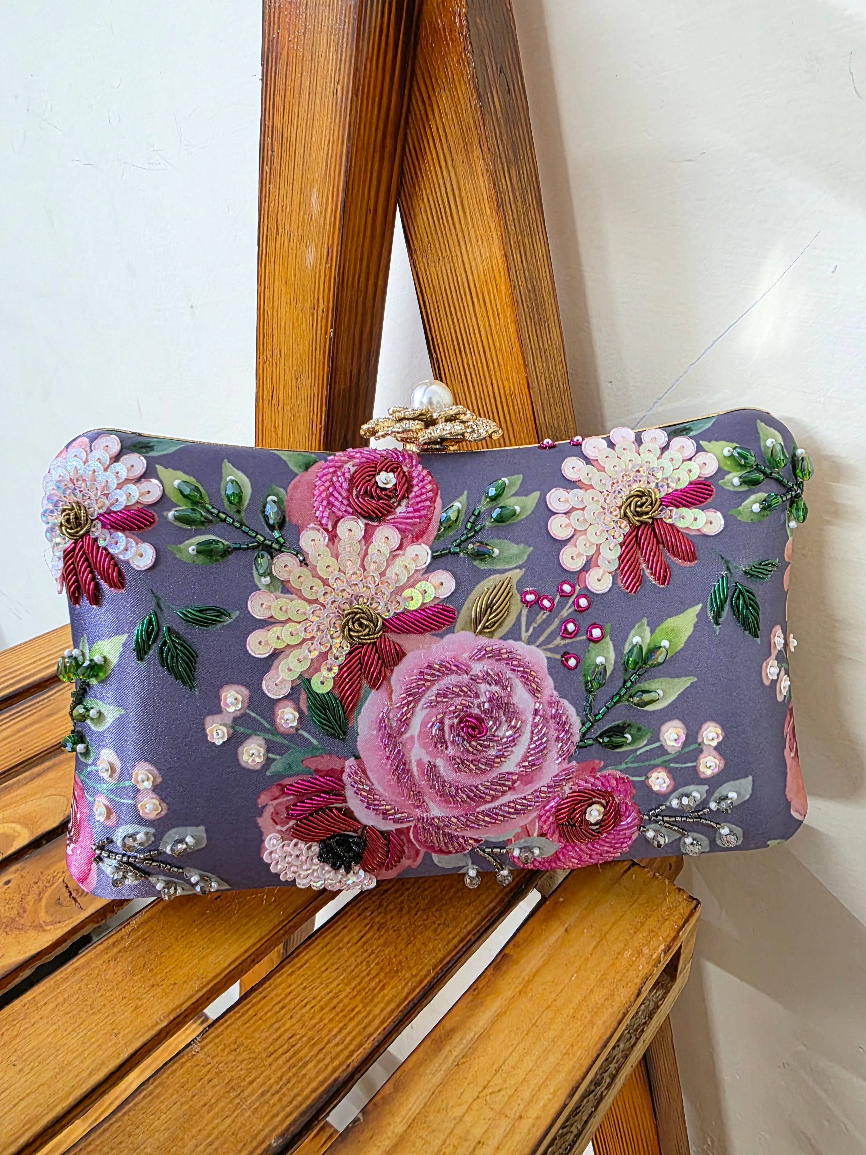 Printed embroidered clutch bag