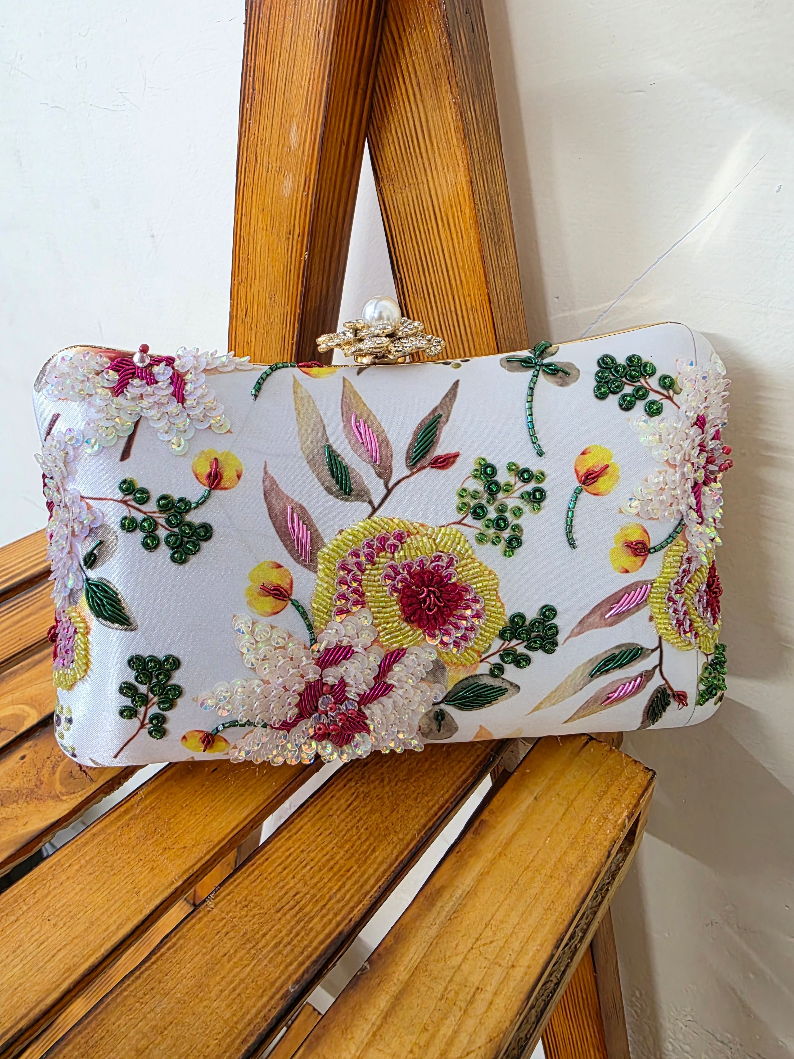 Printed embroidered clutch bag