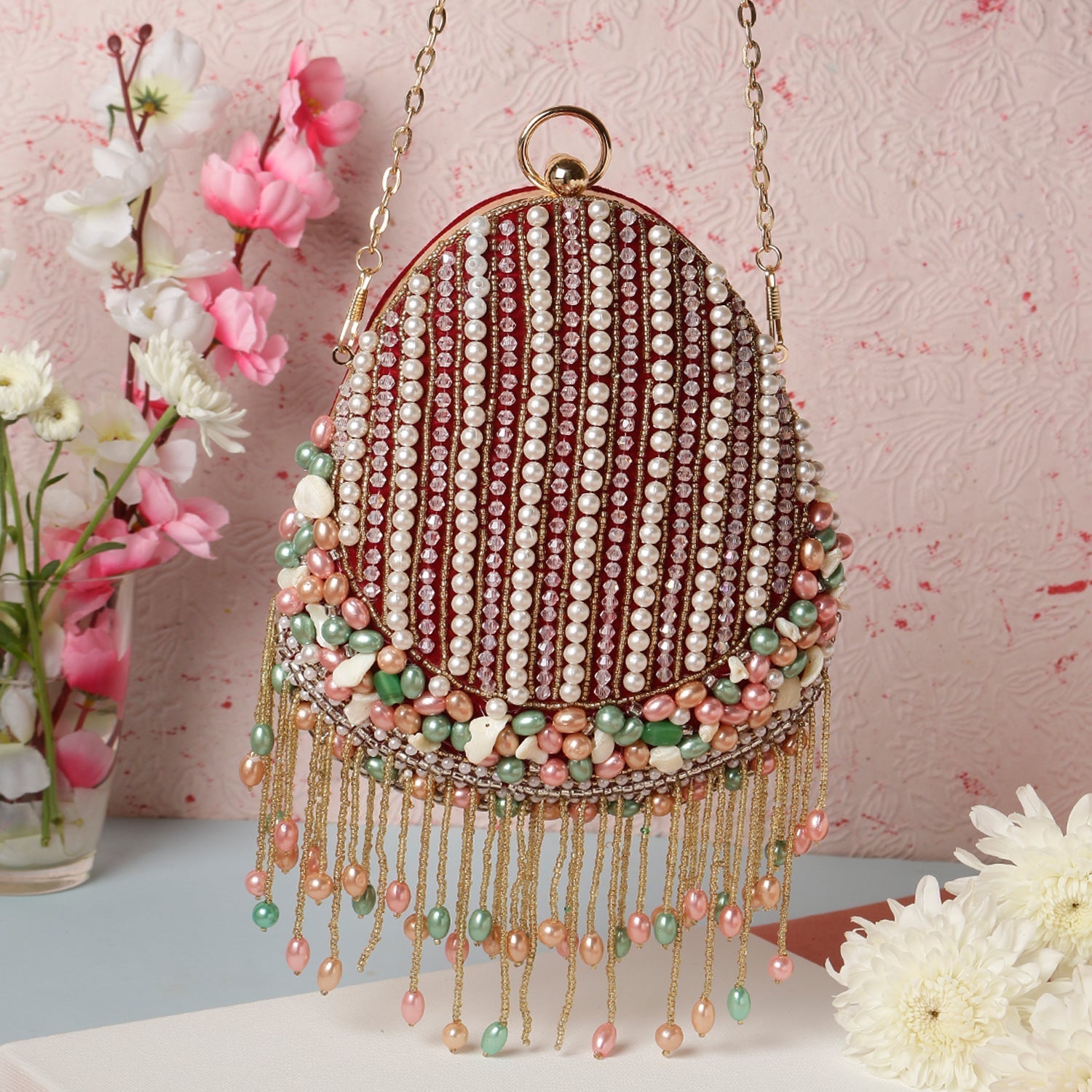 almond shape tassel embroidery clutch