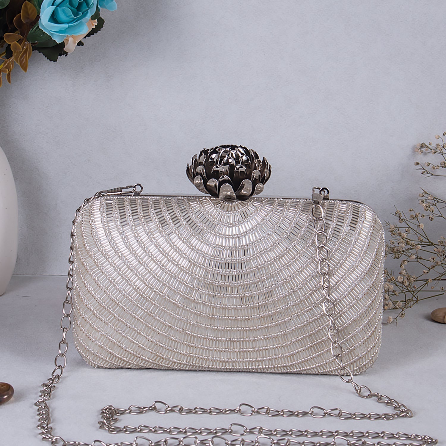 silver embroidered clutch