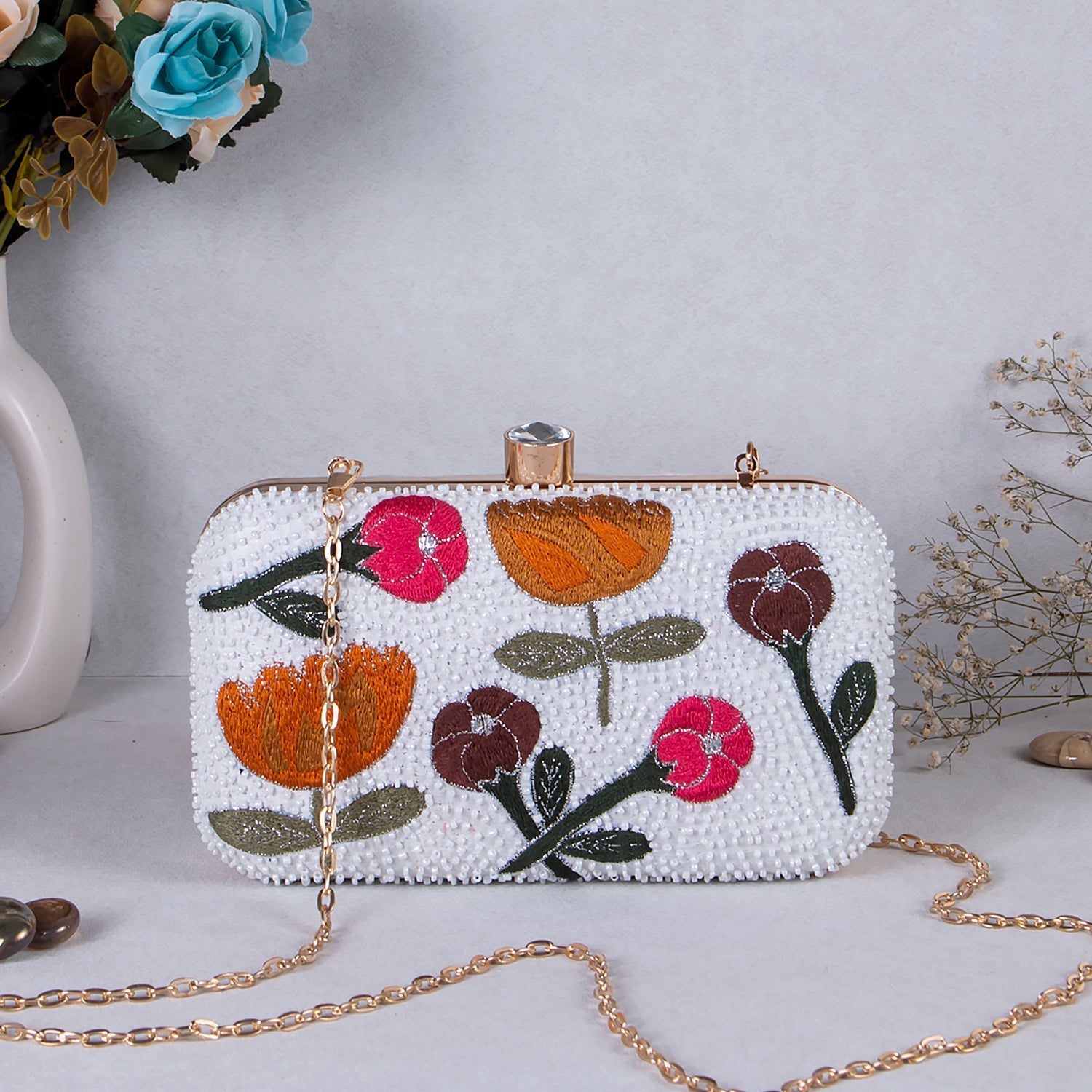 white embroidered clutch