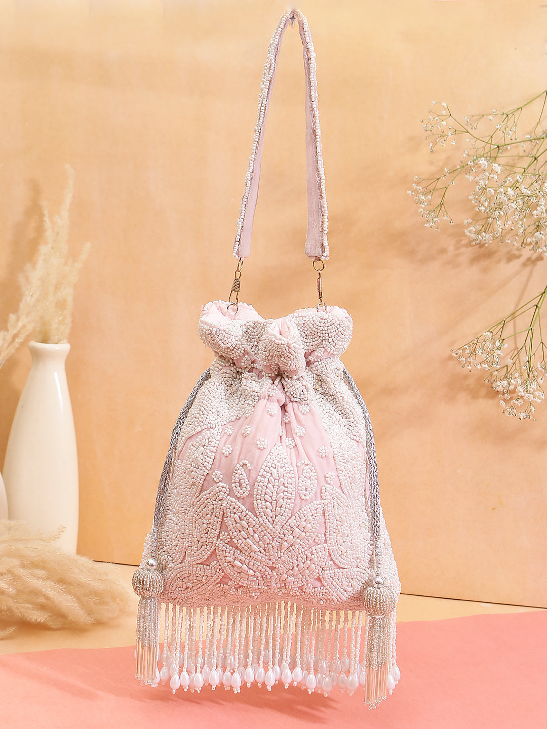 pearl tassel baby pink potli