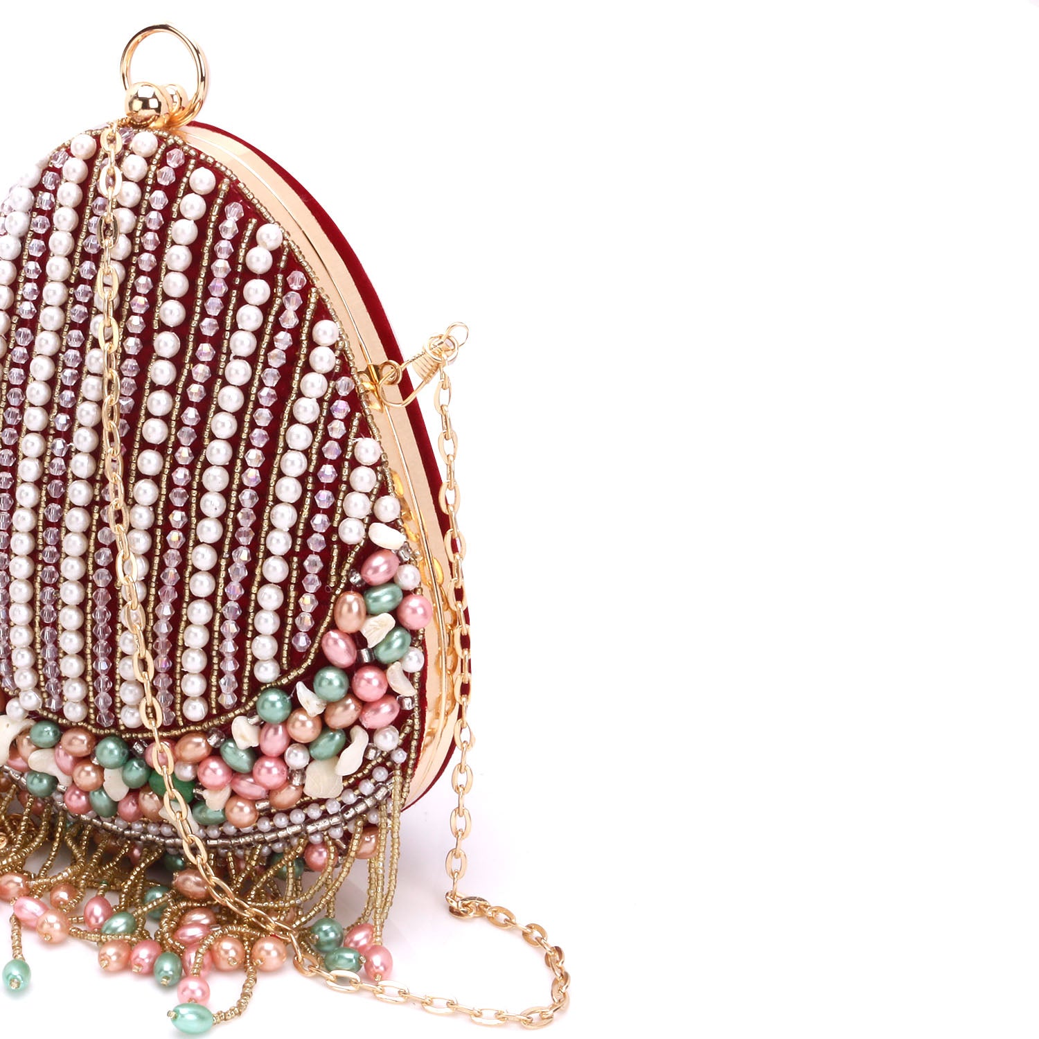 almond shape tassel embroidery clutch