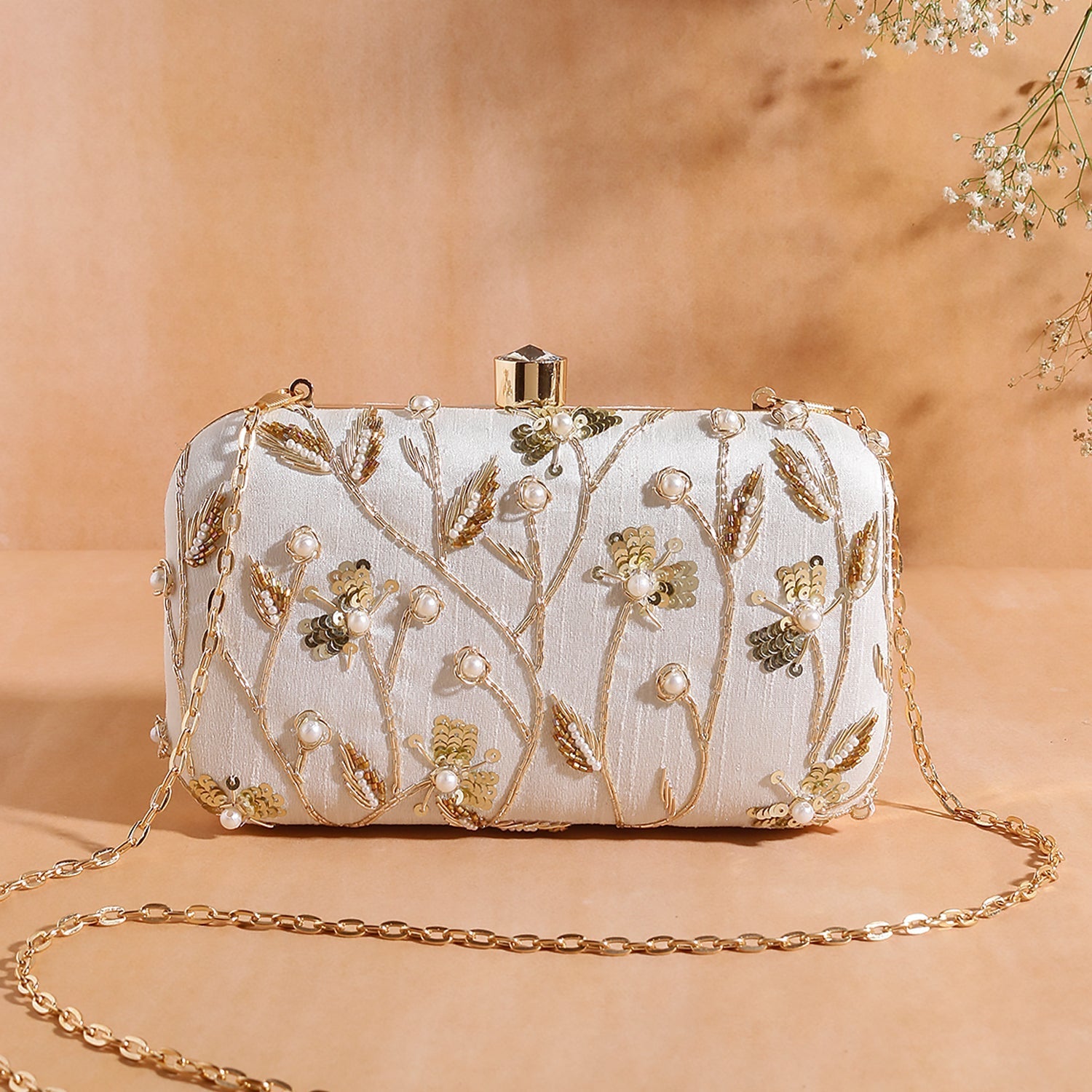 leaf design embroidery clutch