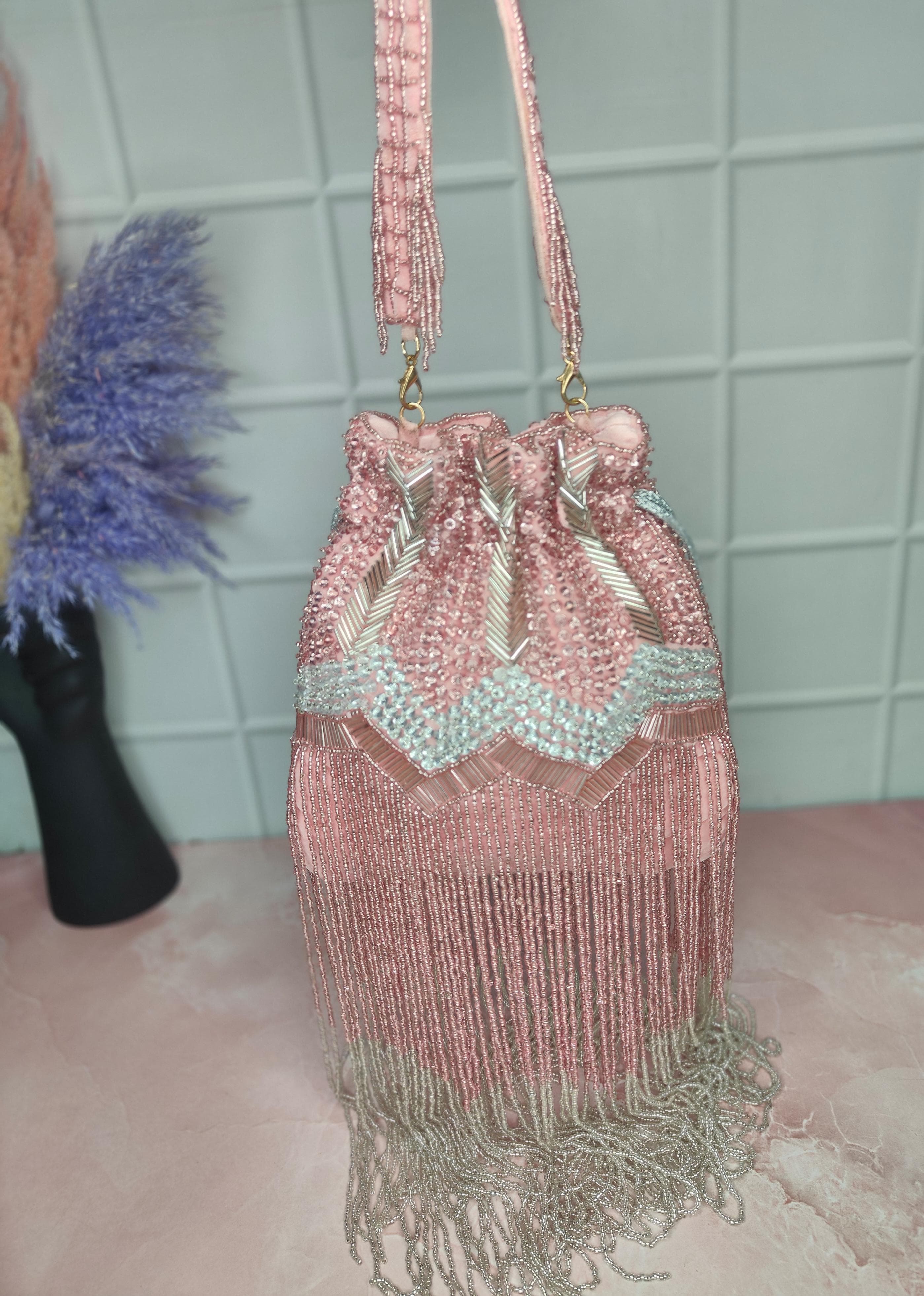 Heavy long tessle Potli