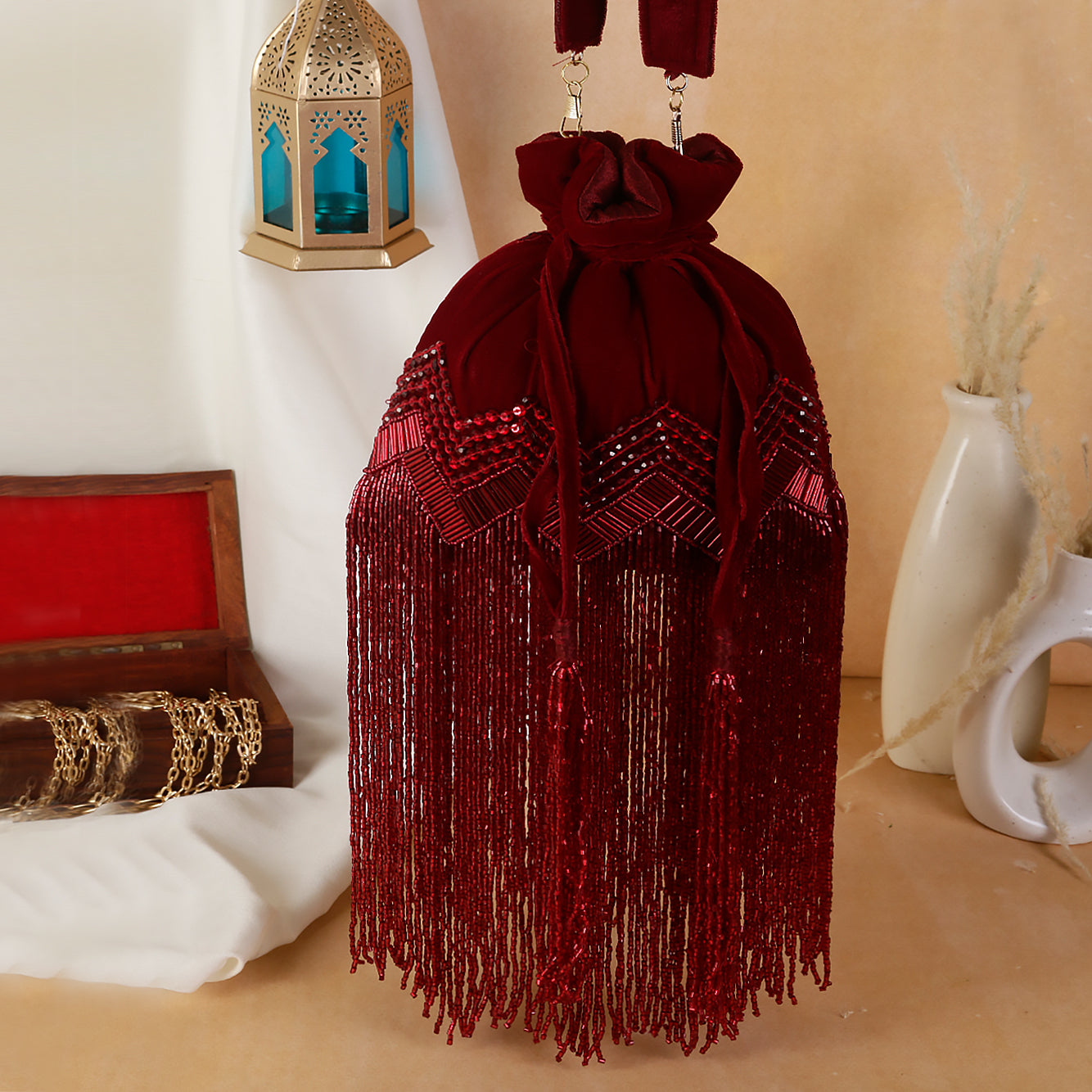 long tassel marron potli