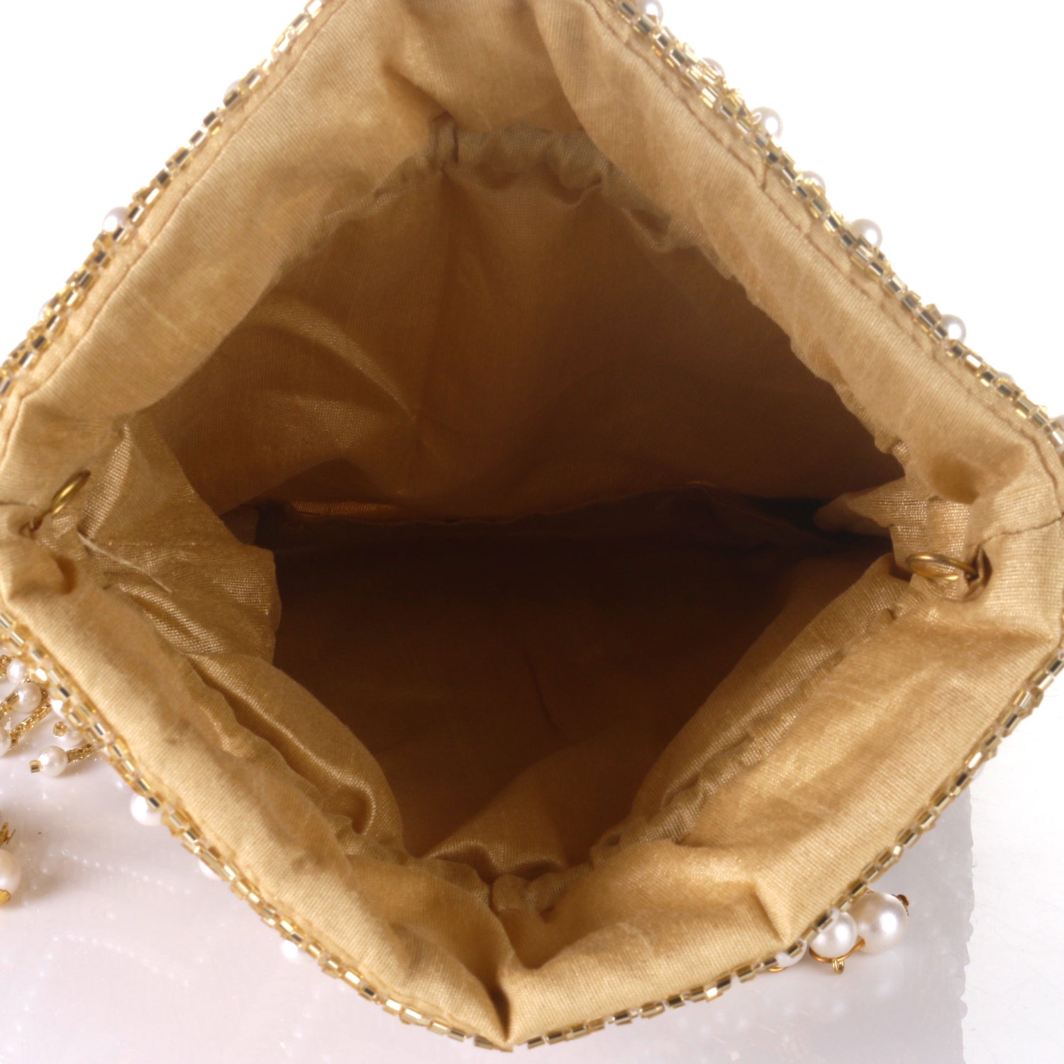 gold tassel sequins design potli