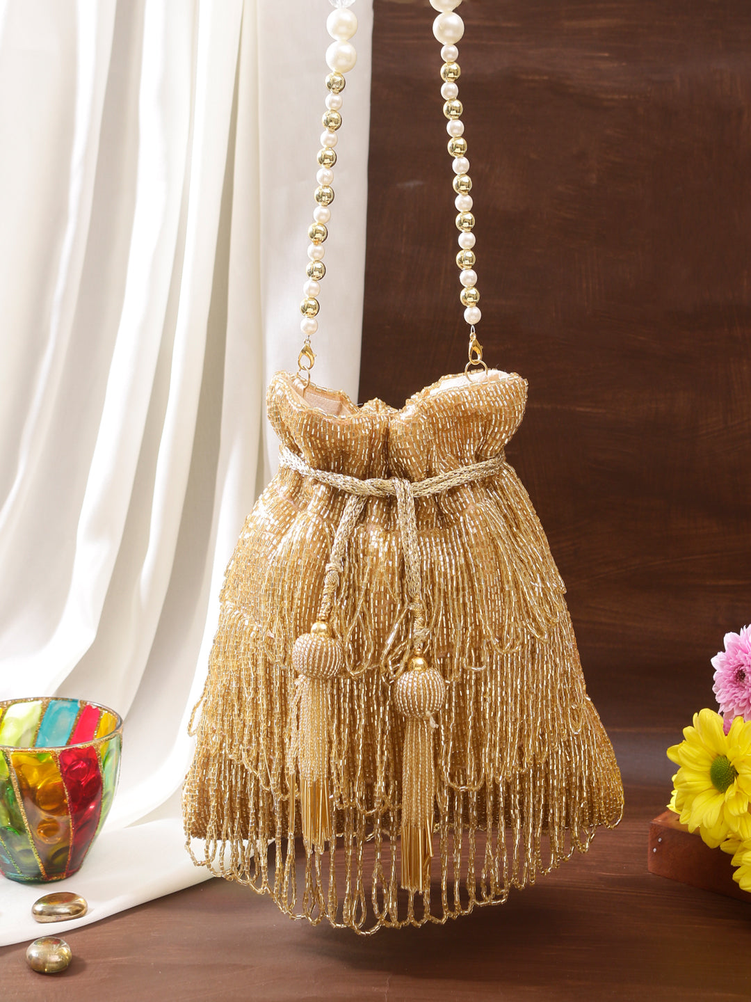 gold three layer tassel potli