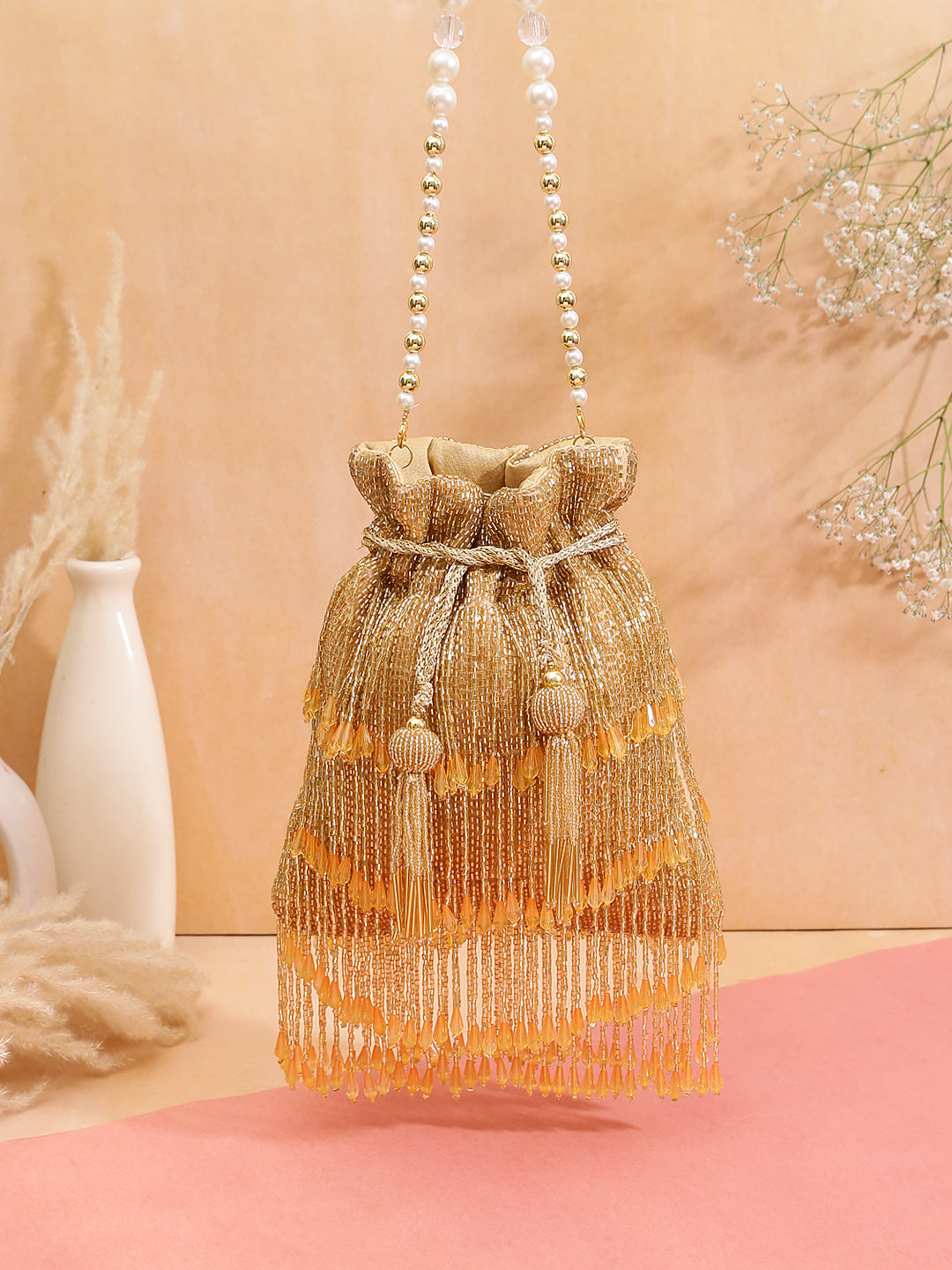 tassel gold potli