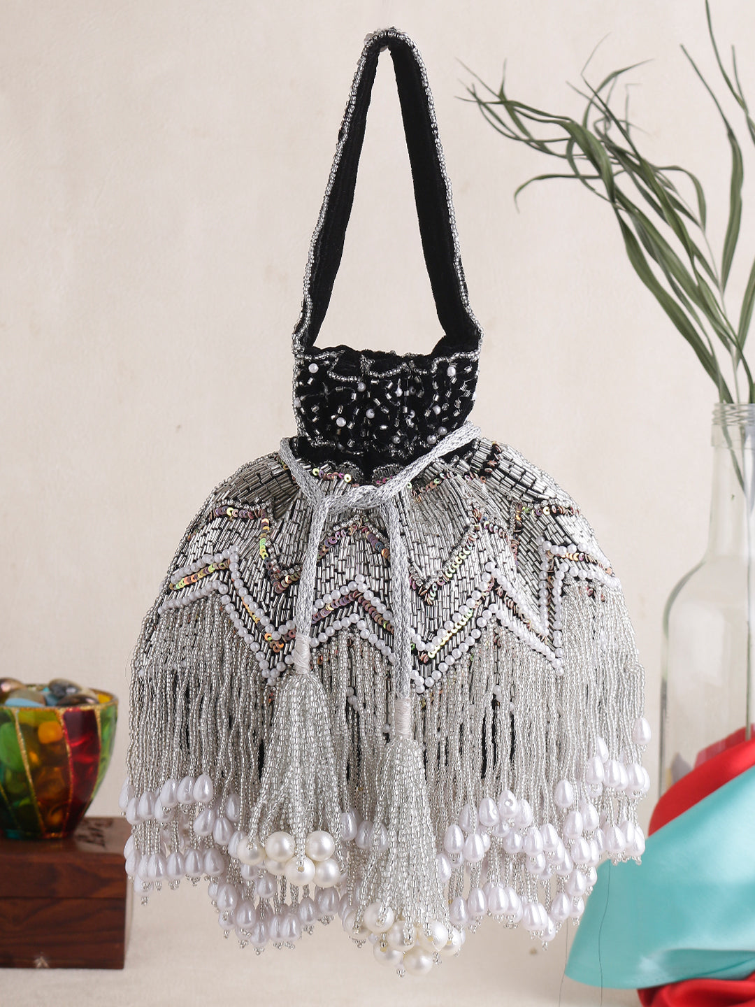 Swisni black jhallar potli bag