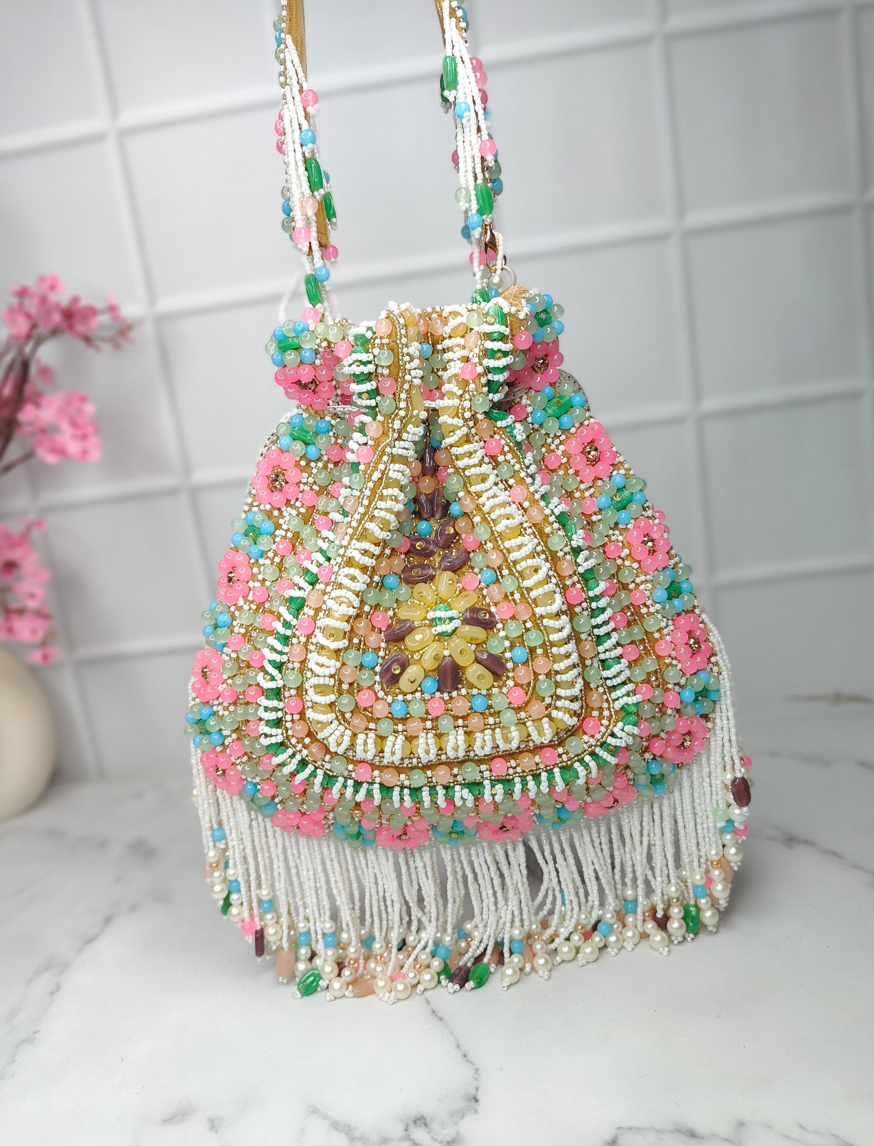 Swisni designer multi potli bag