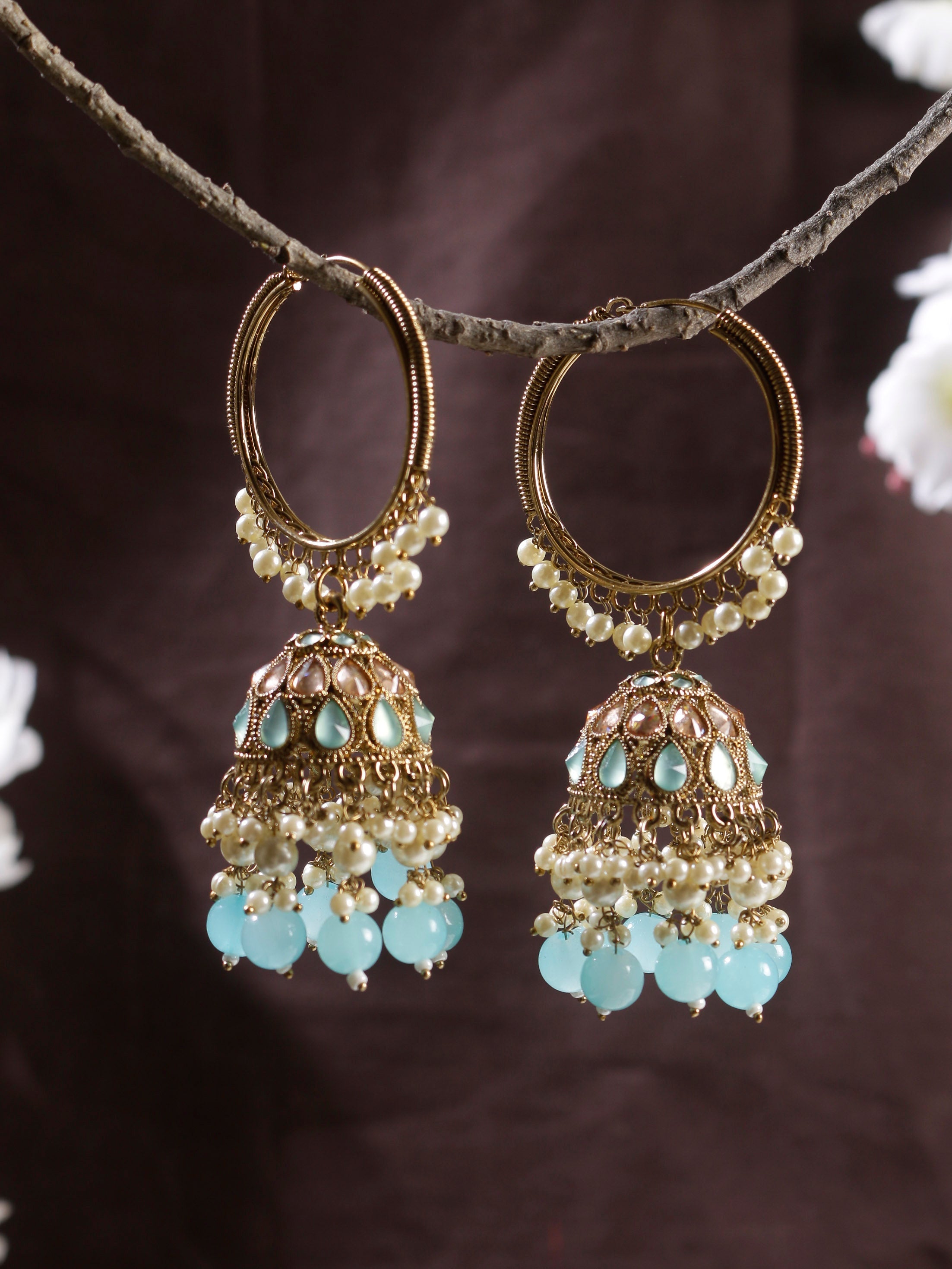 Swisni Alloy Golden Jhumki Earrings with Blue Beads