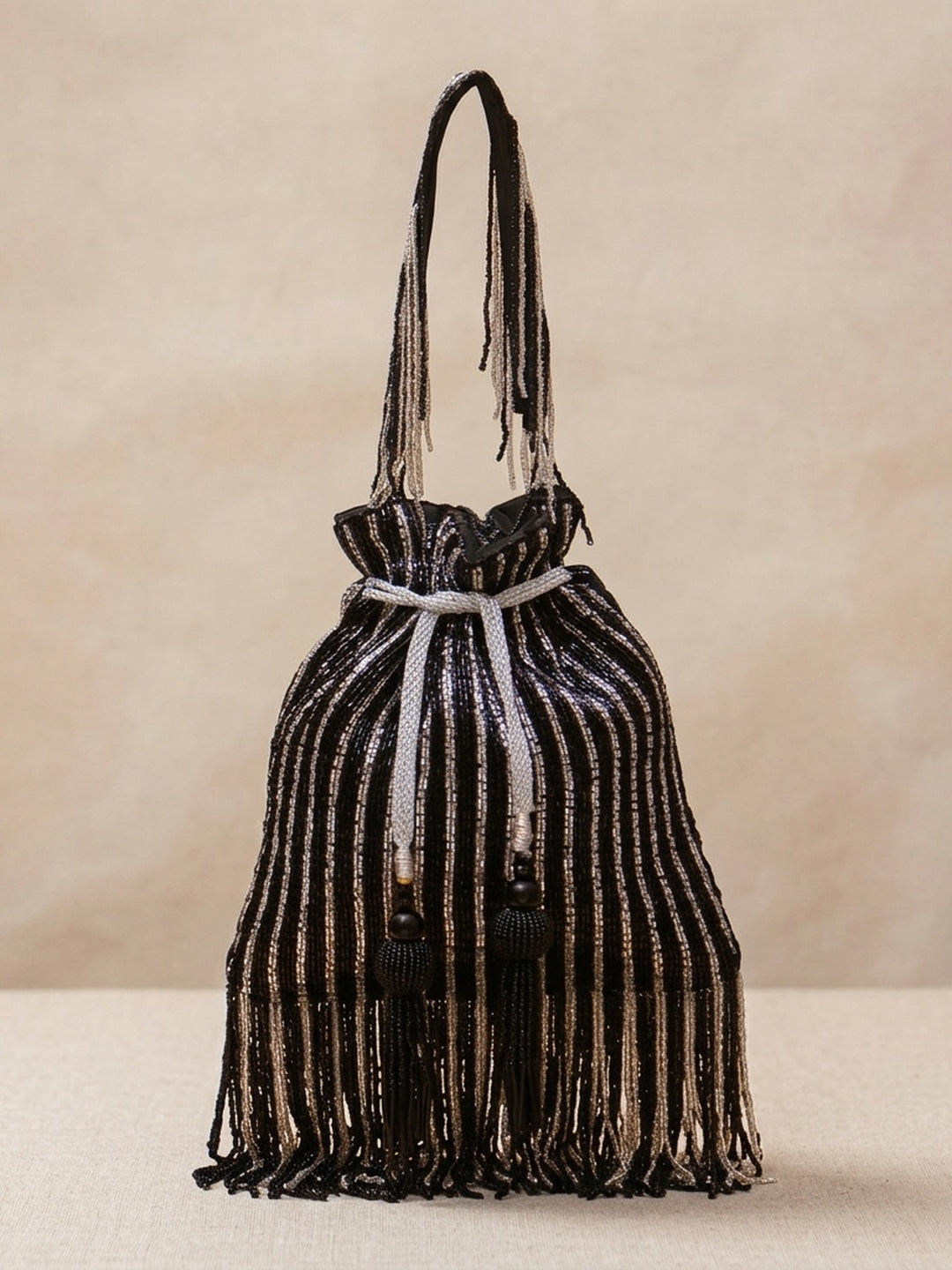 Devika Black — Raw Silk Potli Bag - Front View | SWIS-1306