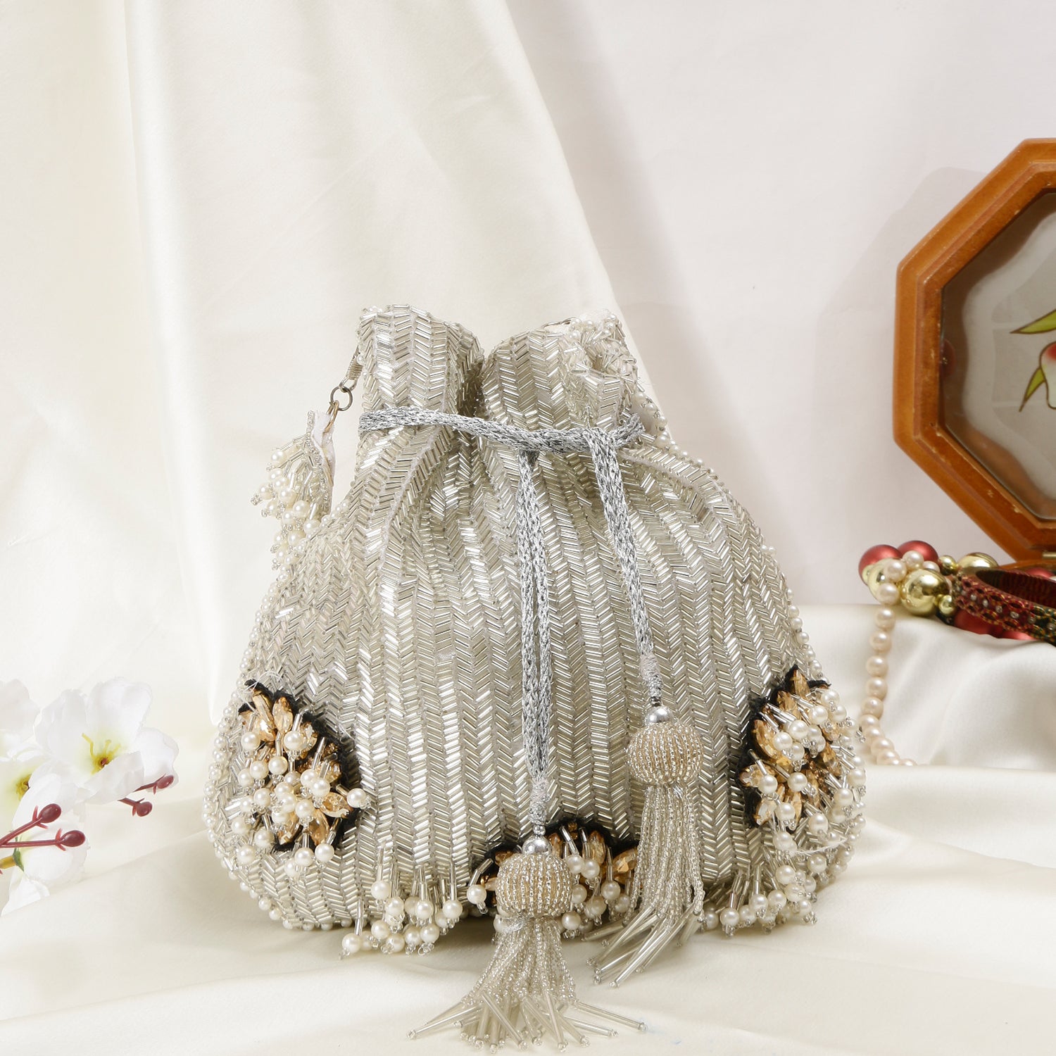 Elegant Silver With Flower Design Embellishment Potli