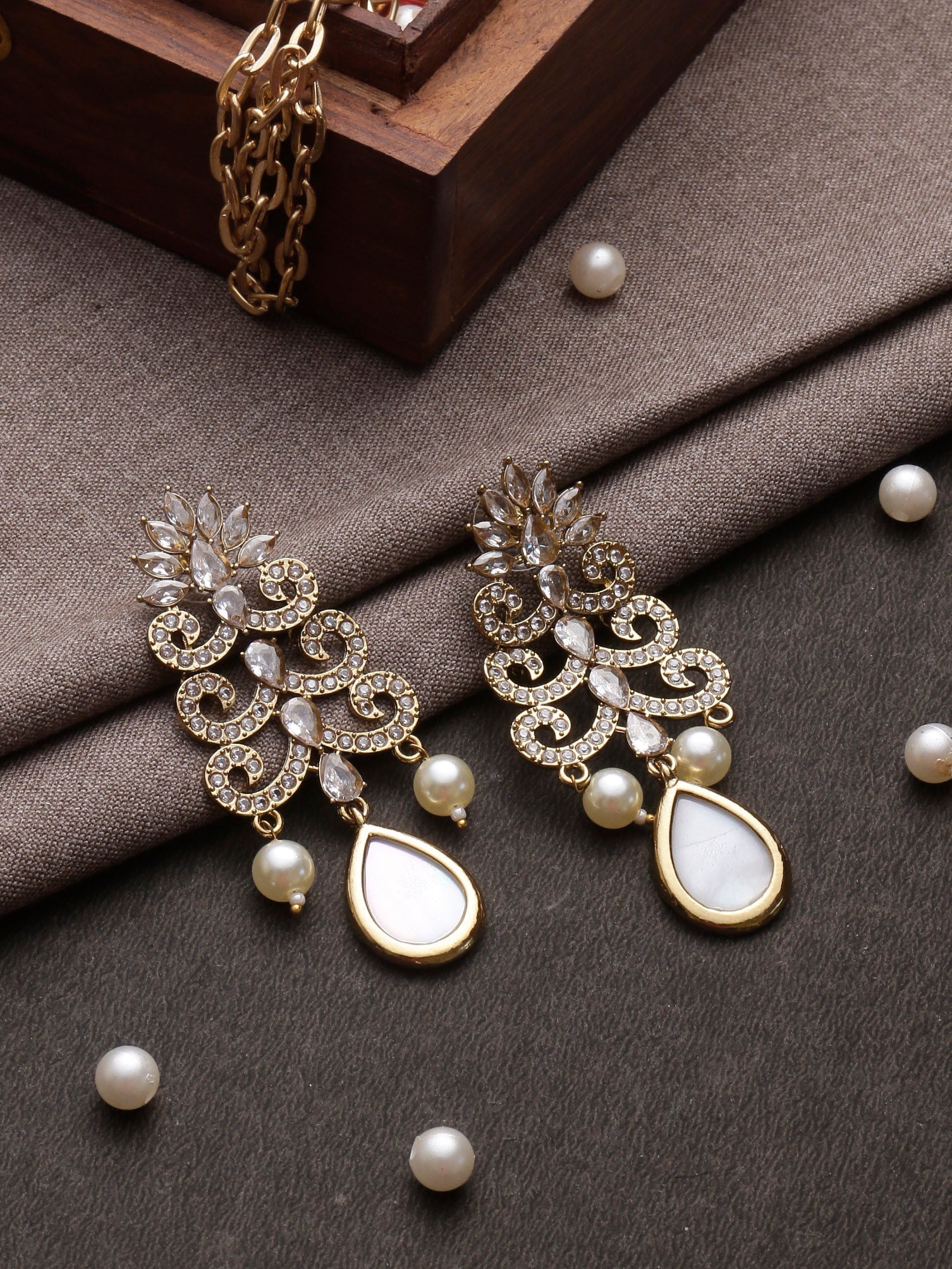 Swisni Alloy Golden Earrings with White Beads