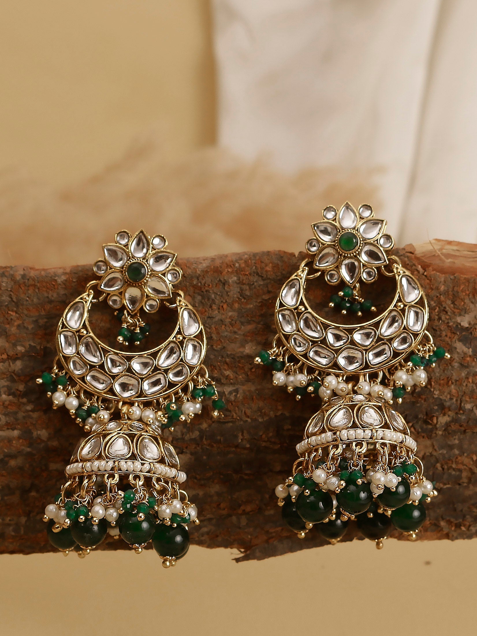 Swisni Alloy Golden Jhumki Earrings with Green Beads