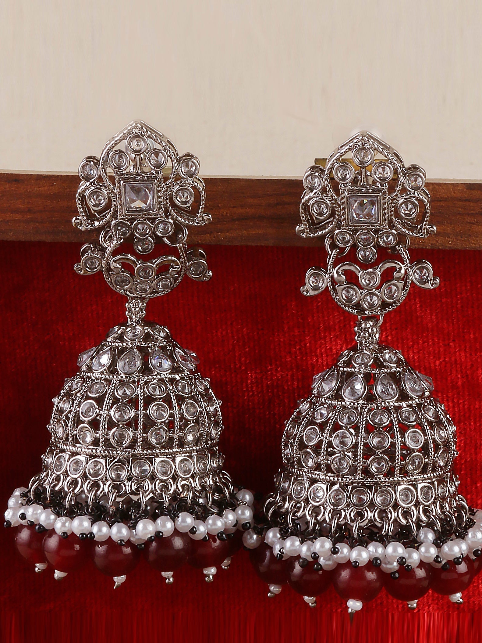 Swisni Alloy Silver Jhumki Earrings with Maroon Beads