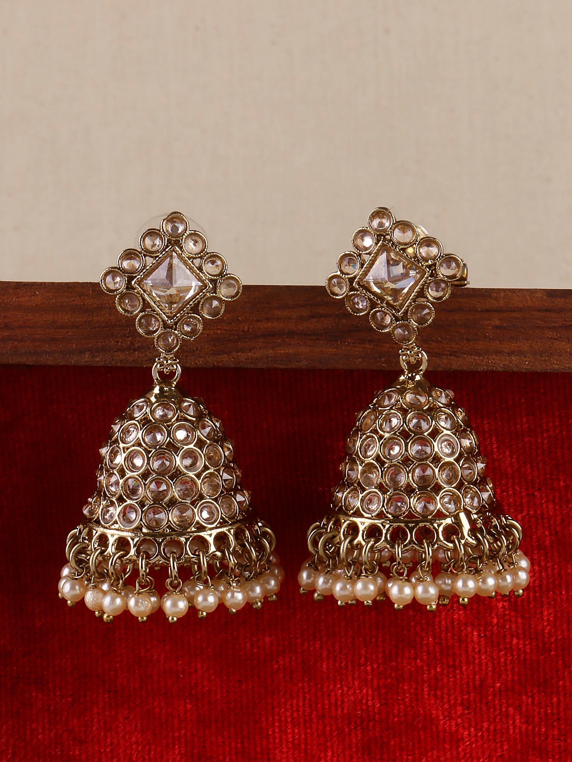 Swisni Alloy Golden Jhumki Earrings with Golden Beads