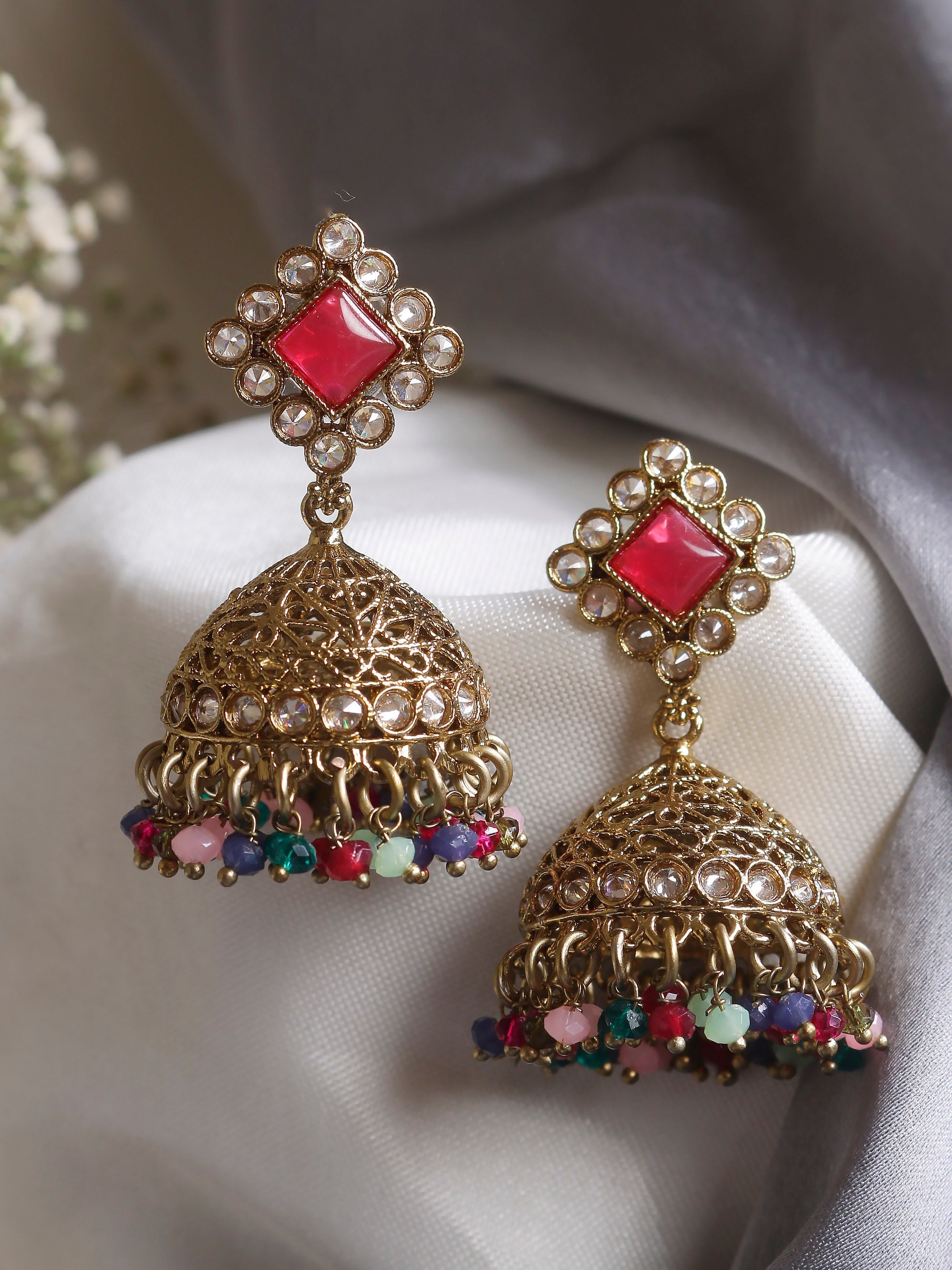 Swisni Alloy Golden Jhumki Earrings with Green Beads