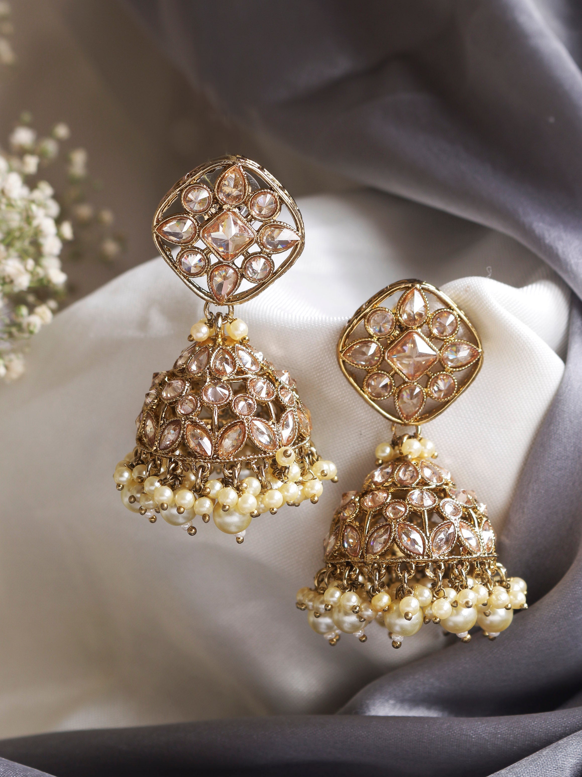Swisni Alloy Golden Jhumki Earrings with Golden Beads